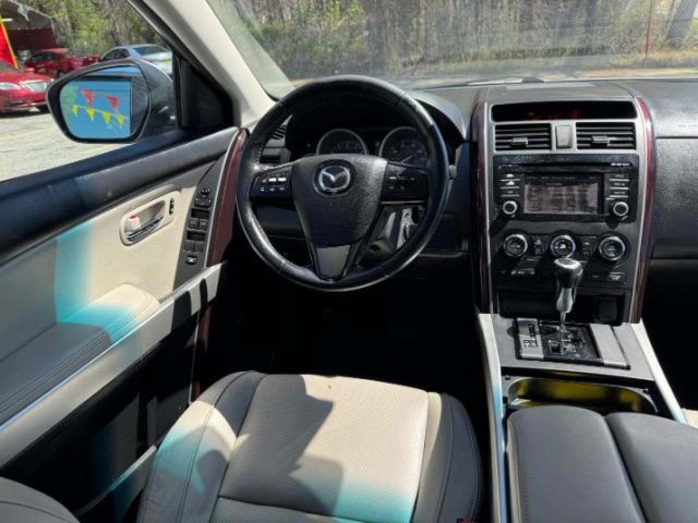 2014 White Mazda CX-9 Grand Touring (JM3TB2DA8E0) with an 3.7L V-6 DOHC engine, located at 1806 Veterans Memorial Hwy SW, Austell, GA, 30168, (770) 944-9558, 33.817959, -84.606987 - Photo#12