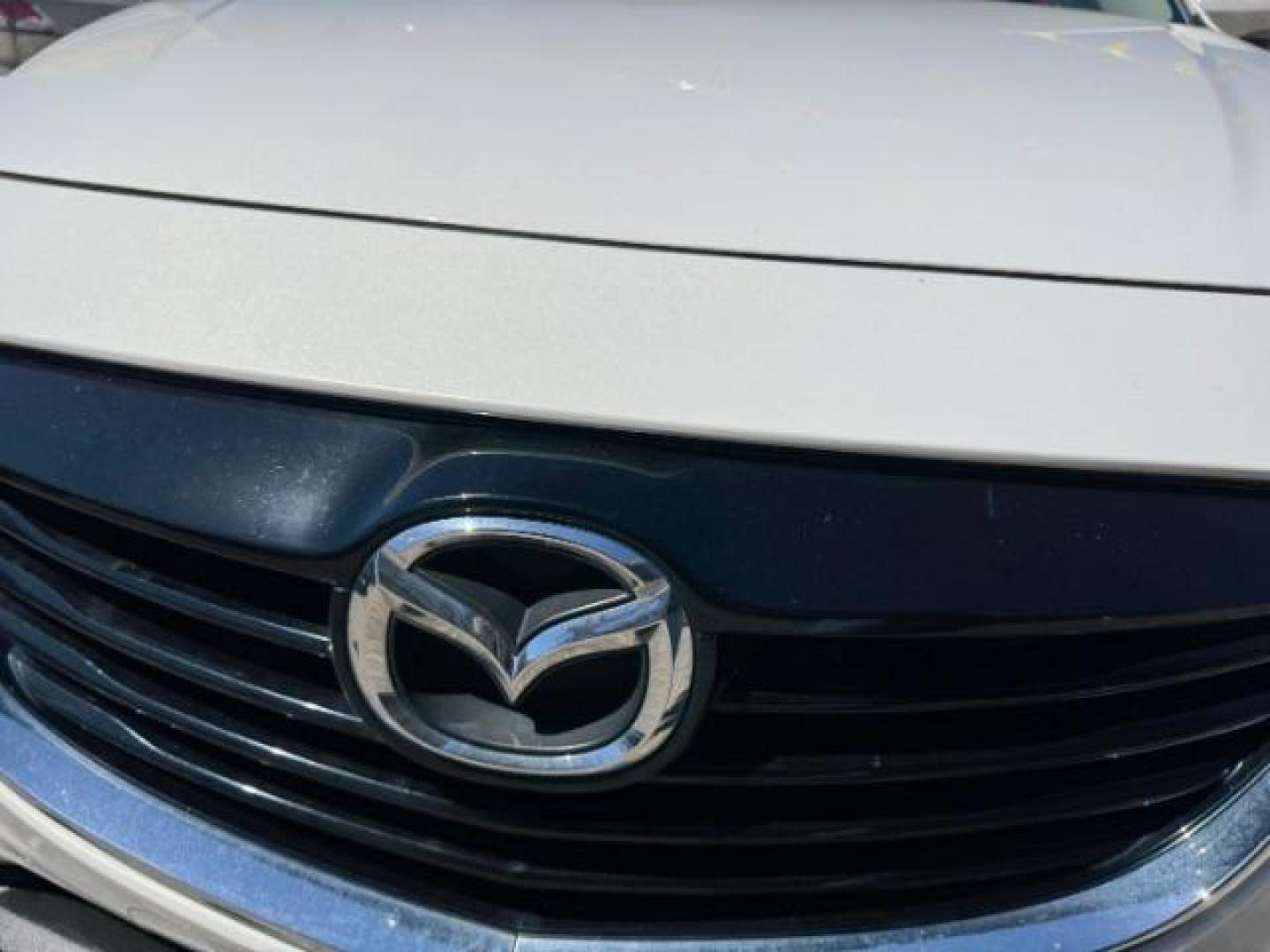 2014 White Mazda CX-9 Grand Touring (JM3TB2DA8E0) with an 3.7L V-6 DOHC engine, located at 1806 Veterans Memorial Hwy SW, Austell, GA, 30168, (770) 944-9558, 33.817959, -84.606987 - Photo#19
