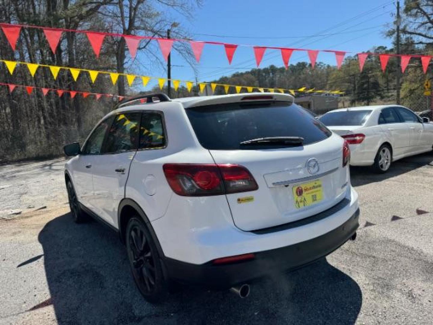 2014 White Mazda CX-9 Grand Touring (JM3TB2DA8E0) with an 3.7L V-6 DOHC engine, located at 1806 Veterans Memorial Hwy SW, Austell, GA, 30168, (770) 944-9558, 33.817959, -84.606987 - Photo#5