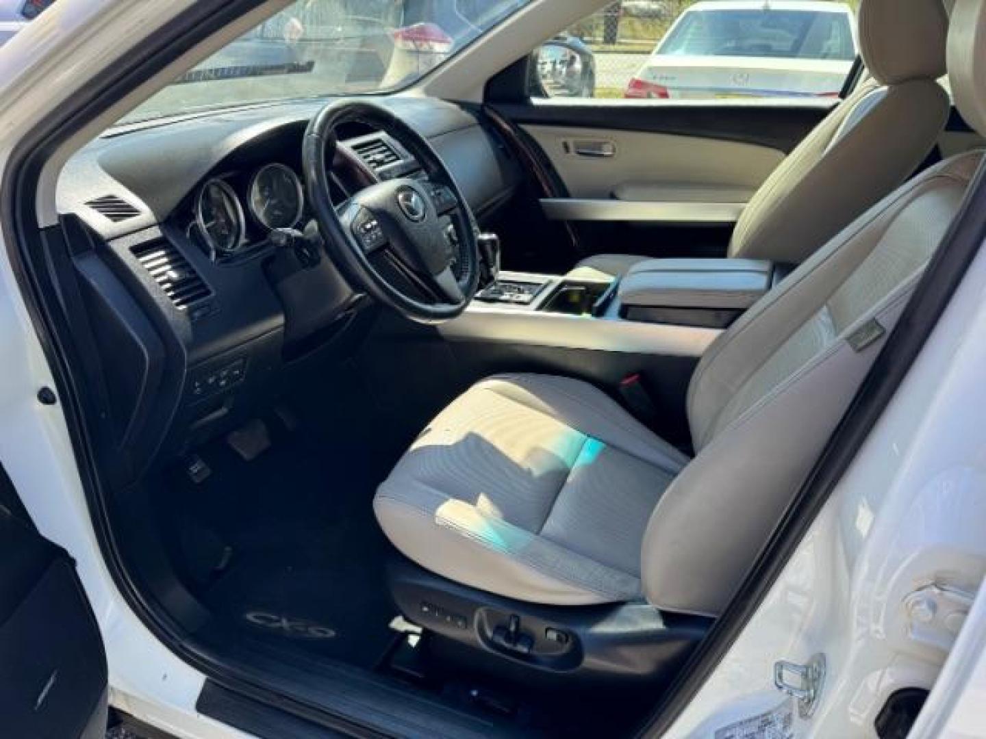 2014 White Mazda CX-9 Grand Touring (JM3TB2DA8E0) with an 3.7L V-6 DOHC engine, located at 1806 Veterans Memorial Hwy SW, Austell, GA, 30168, (770) 944-9558, 33.817959, -84.606987 - Photo#6