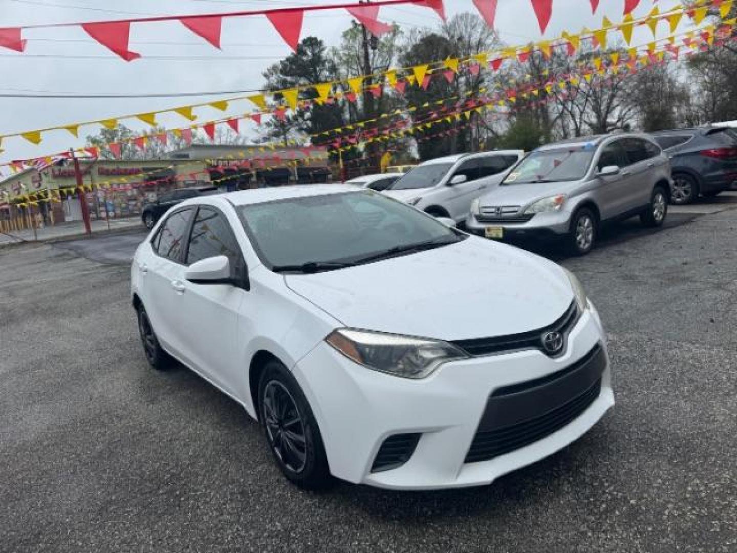 2015 White Toyota Corolla LE (2T1BURHE6FC) with an 1.8L I-4 DOHC engine, located at 1806 Veterans Memorial Hwy SW, Austell, GA, 30168, (770) 944-9558, 33.817959, -84.606987 - Photo#1