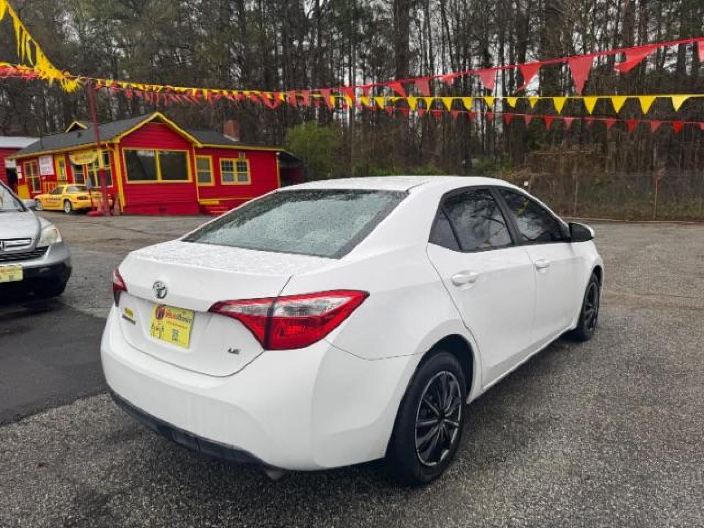 2015 White Toyota Corolla LE (2T1BURHE6FC) with an 1.8L I-4 DOHC engine, located at 1806 Veterans Memorial Hwy SW, Austell, GA, 30168, (770) 944-9558, 33.817959, -84.606987 - Photo#2