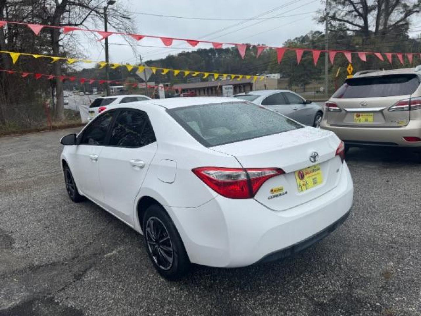 2015 White Toyota Corolla LE (2T1BURHE6FC) with an 1.8L I-4 DOHC engine, located at 1806 Veterans Memorial Hwy SW, Austell, GA, 30168, (770) 944-9558, 33.817959, -84.606987 - Photo#4