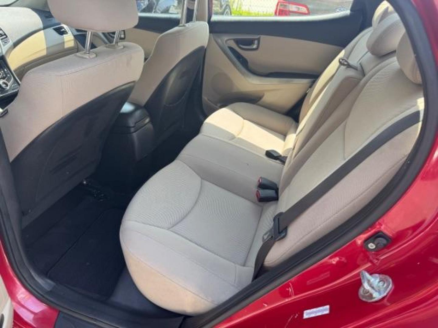 2015 Red Hyundai Elantra SE (KMHDH4AE7FU) with an Nu 1.8L I-4 DOHC engine, located at 1806 Veterans Memorial Hwy SW, Austell, GA, 30168, (770) 944-9558, 33.817959, -84.606987 - Photo#3