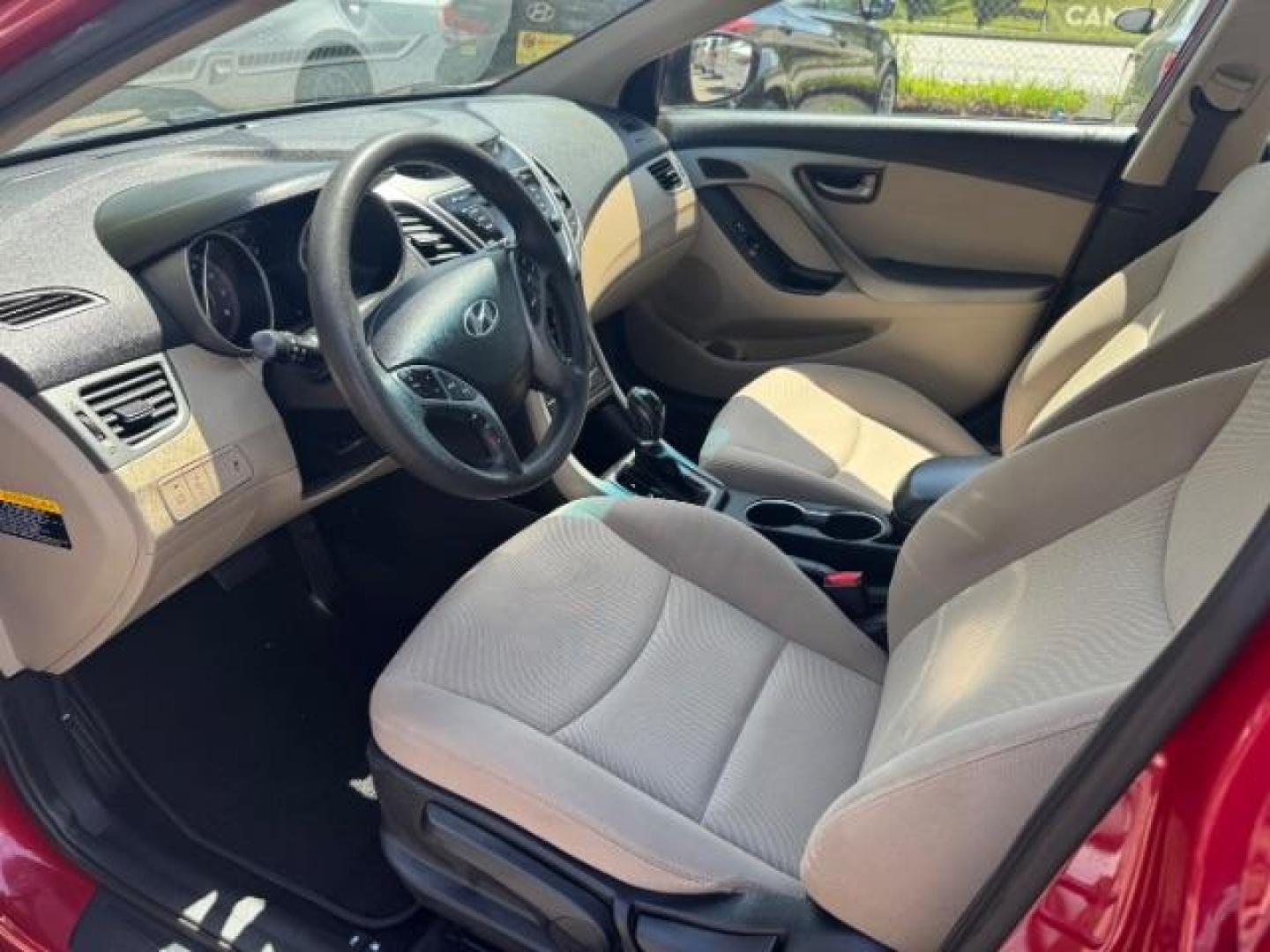 2015 Red Hyundai Elantra SE (KMHDH4AE7FU) with an Nu 1.8L I-4 DOHC engine, located at 1806 Veterans Memorial Hwy SW, Austell, GA, 30168, (770) 944-9558, 33.817959, -84.606987 - Photo#5