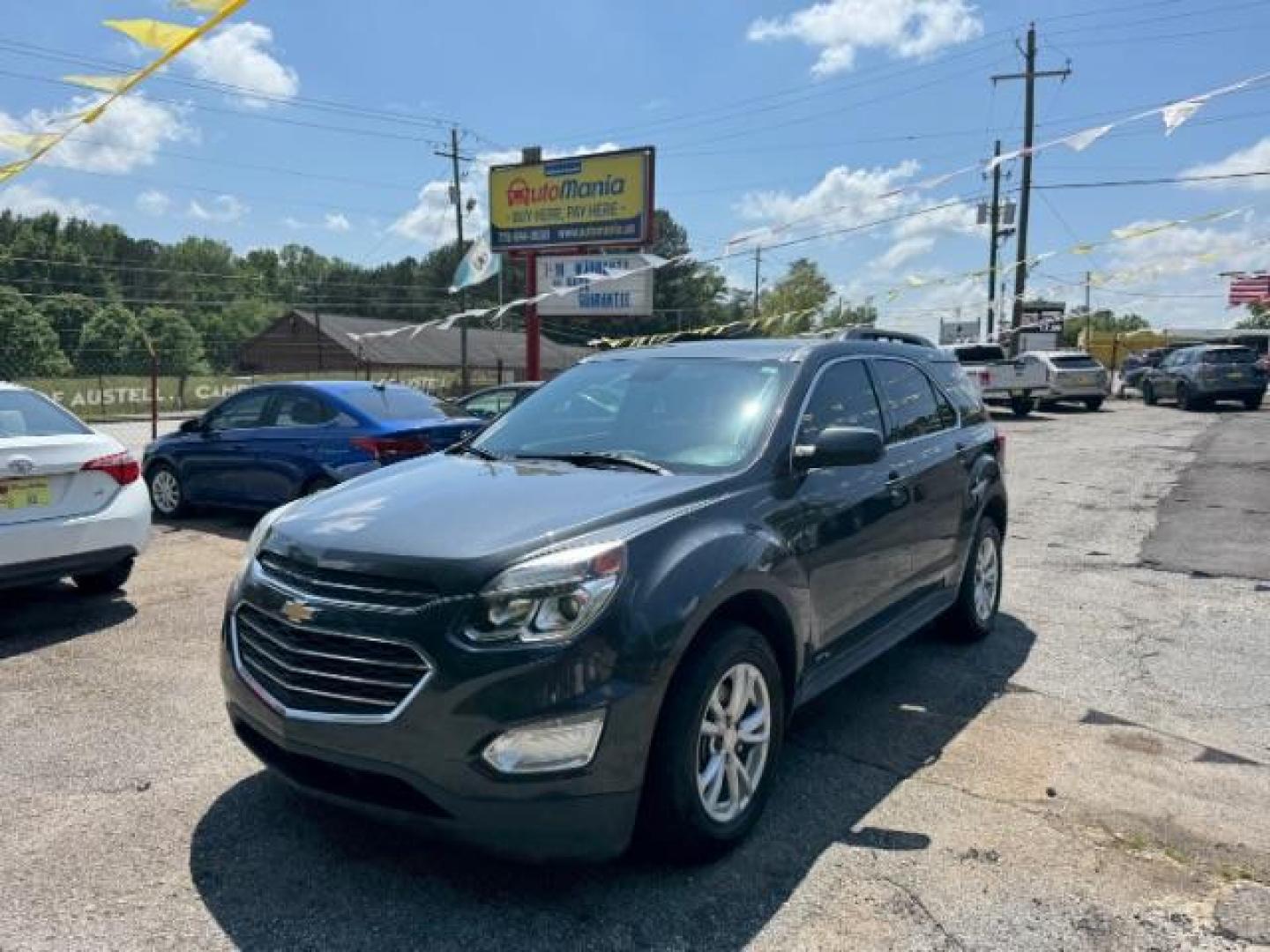 2017 Gray Chevrolet Equinox LT (2GNALCEK0H1) with an 2.4L I-4 gasoline direct injection engine, located at 1806 Veterans Memorial Hwy SW, Austell, GA, 30168, (770) 944-9558, 33.817959, -84.606987 - Photo#0