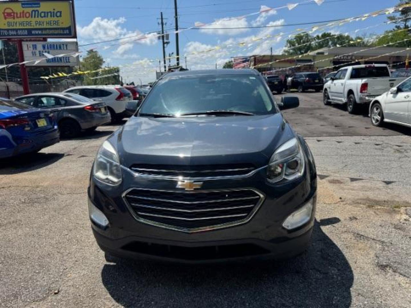 2017 Gray Chevrolet Equinox LT (2GNALCEK0H1) with an 2.4L I-4 gasoline direct injection engine, located at 1806 Veterans Memorial Hwy SW, Austell, GA, 30168, (770) 944-9558, 33.817959, -84.606987 - Photo#1