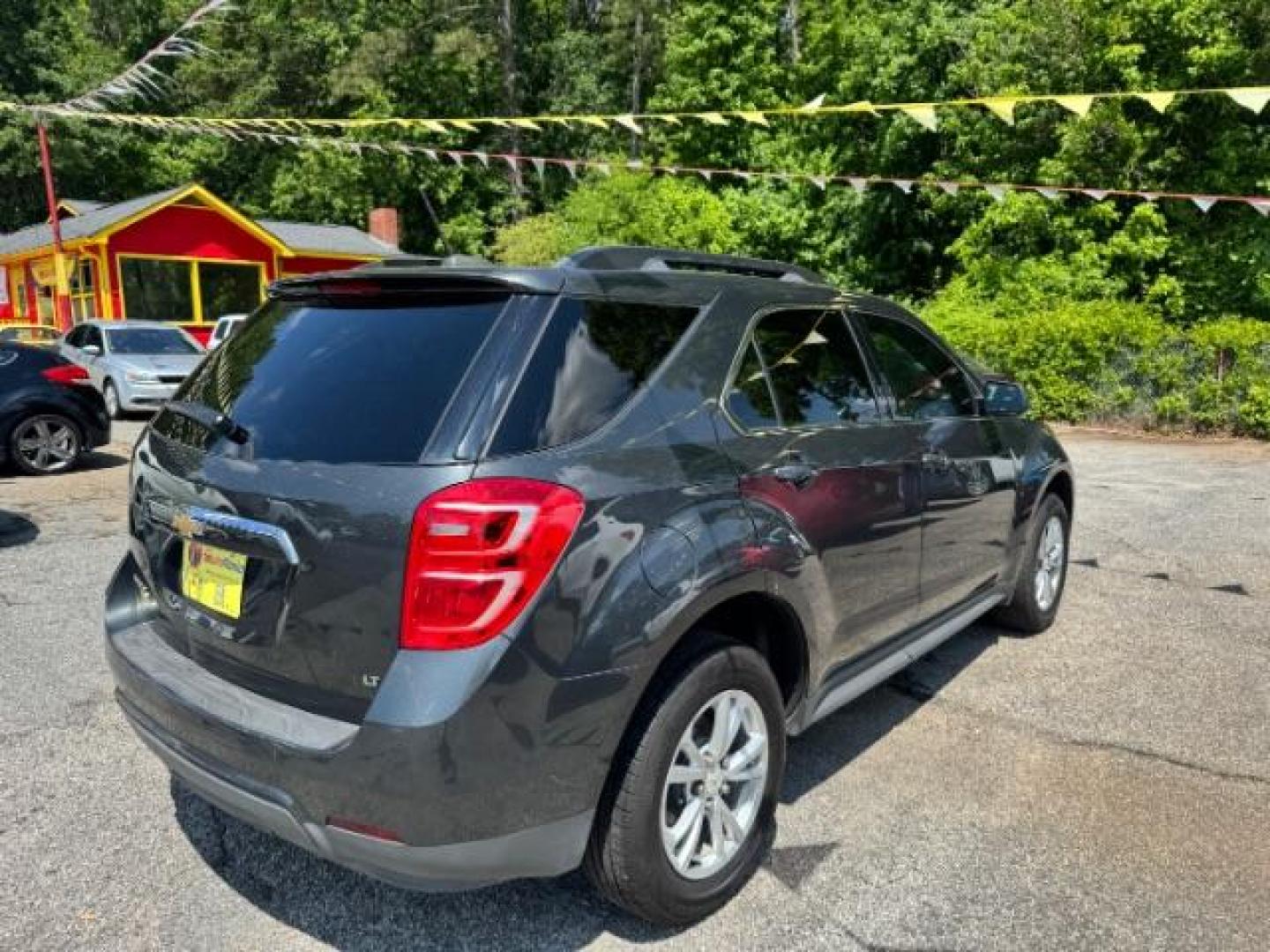 2017 Gray Chevrolet Equinox LT (2GNALCEK0H1) with an 2.4L I-4 gasoline direct injection engine, located at 1806 Veterans Memorial Hwy SW, Austell, GA, 30168, (770) 944-9558, 33.817959, -84.606987 - Photo#3