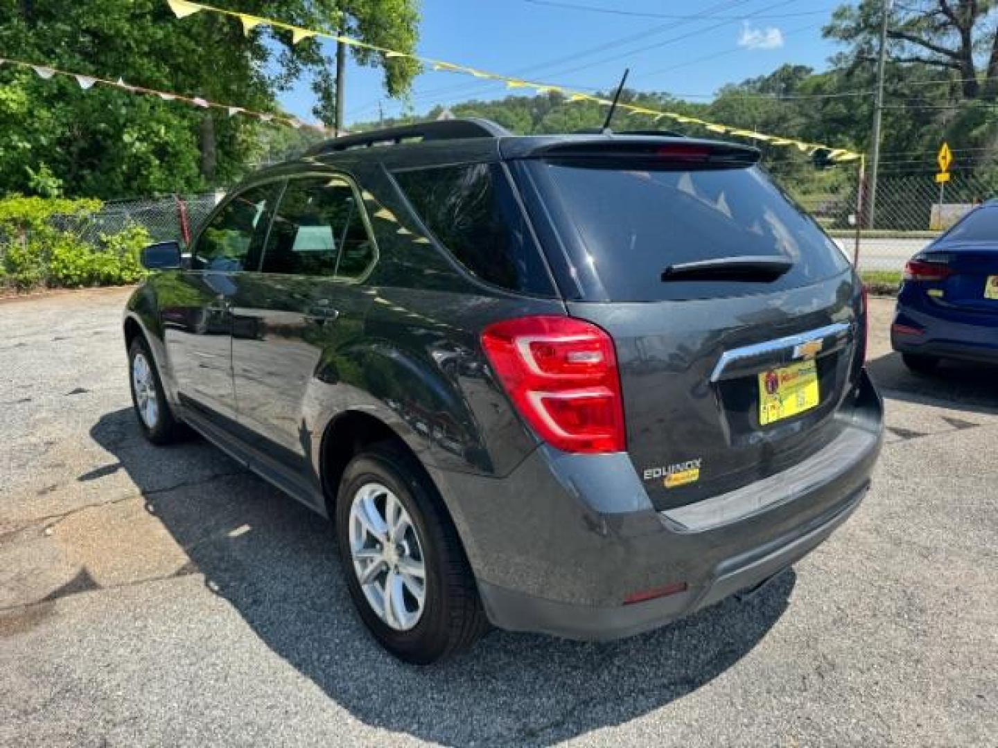 2017 Gray Chevrolet Equinox LT (2GNALCEK0H1) with an 2.4L I-4 gasoline direct injection engine, located at 1806 Veterans Memorial Hwy SW, Austell, GA, 30168, (770) 944-9558, 33.817959, -84.606987 - Photo#5