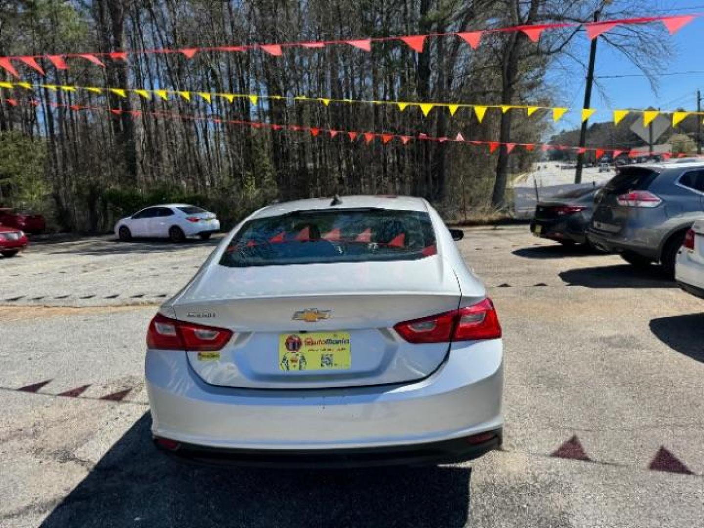 2019 Silver Chevrolet Malibu 1LS (1G1ZB5ST4KF) with an ECOTEC 1.5L I-4 gasoline direct injection engine, located at 1806 Veterans Memorial Hwy SW, Austell, GA, 30168, (770) 944-9558, 33.817959, -84.606987 - Photo#3