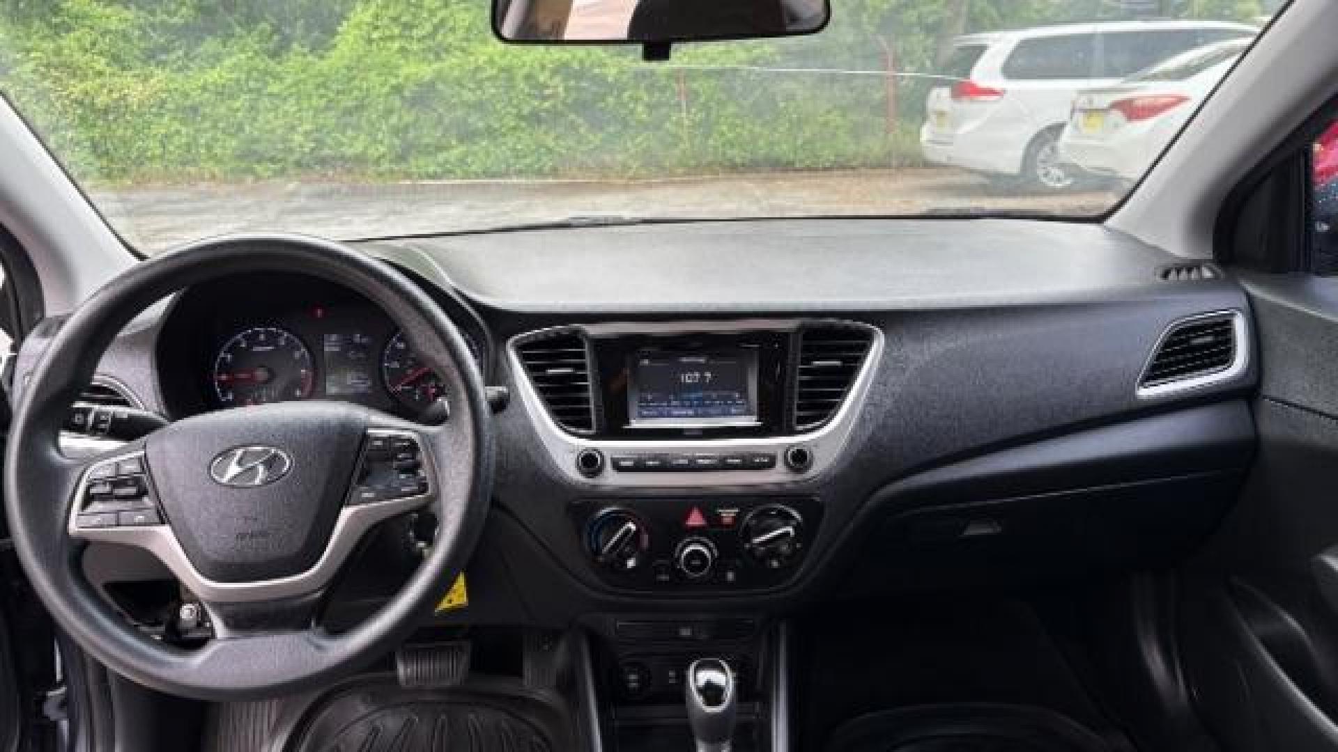2018 Gray Hyundai Accent SE (3KPC24A3XJE) with an 1.6L I-4 gasoline direct injection engine, located at 1806 Veterans Memorial Hwy SW, Austell, GA, 30168, (770) 944-9558, 33.817959, -84.606987 - Photo#10