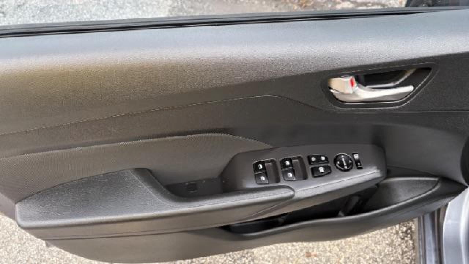 2018 Gray Hyundai Accent SE (3KPC24A3XJE) with an 1.6L I-4 gasoline direct injection engine, located at 1806 Veterans Memorial Hwy SW, Austell, GA, 30168, (770) 944-9558, 33.817959, -84.606987 - Photo#11