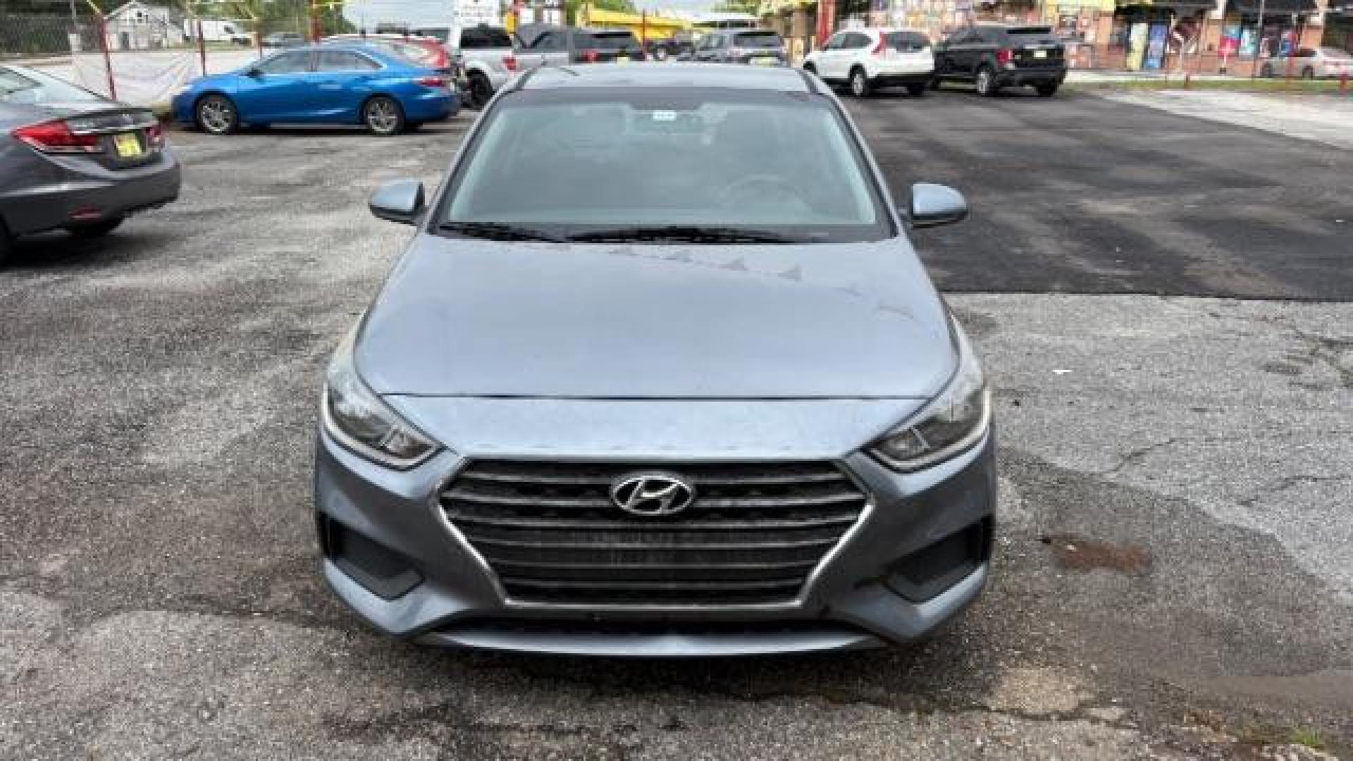 2018 Gray Hyundai Accent SE (3KPC24A3XJE) with an 1.6L I-4 gasoline direct injection engine, located at 1806 Veterans Memorial Hwy SW, Austell, GA, 30168, (770) 944-9558, 33.817959, -84.606987 - Photo#1