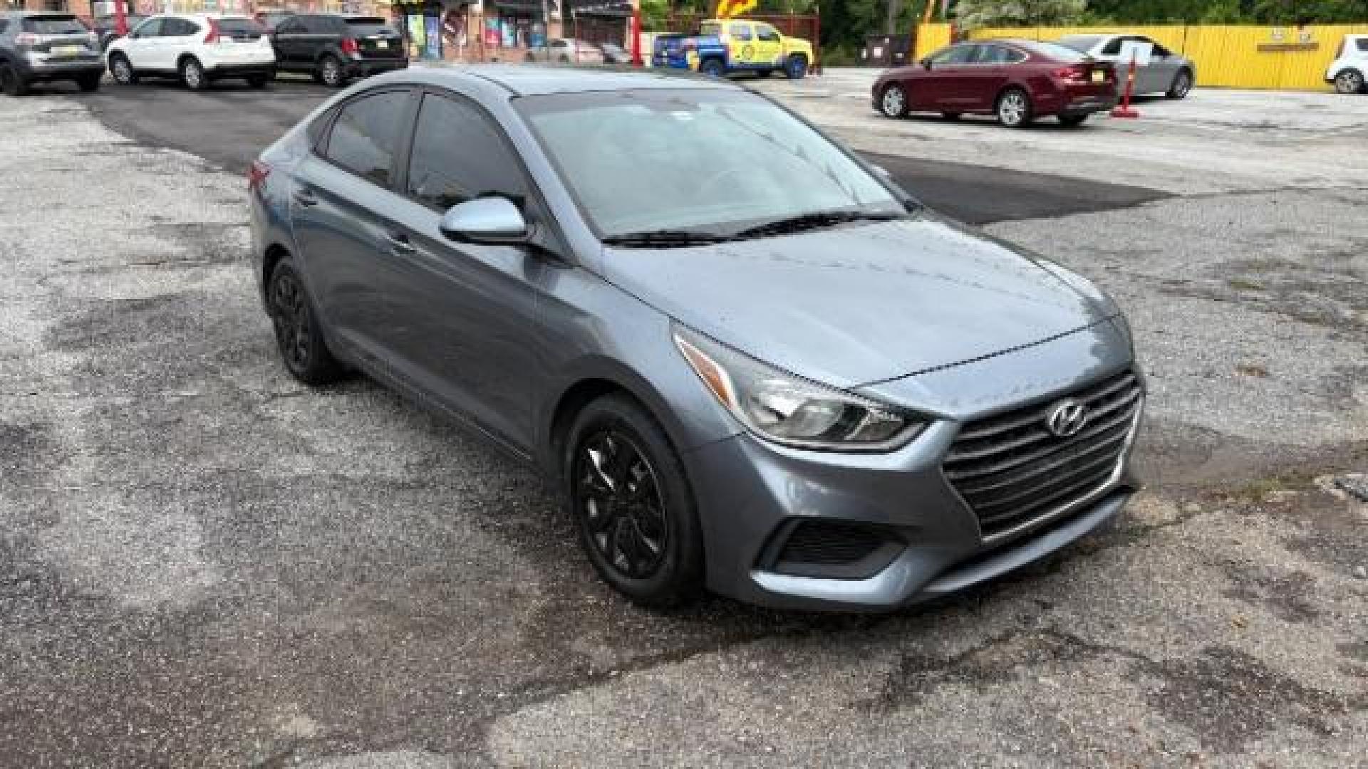 2018 Gray Hyundai Accent SE (3KPC24A3XJE) with an 1.6L I-4 gasoline direct injection engine, located at 1806 Veterans Memorial Hwy SW, Austell, GA, 30168, (770) 944-9558, 33.817959, -84.606987 - Photo#2