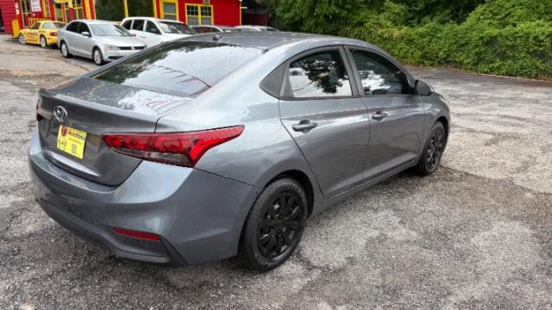 2018 Gray Hyundai Accent SE (3KPC24A3XJE) with an 1.6L I-4 gasoline direct injection engine, located at 1806 Veterans Memorial Hwy SW, Austell, GA, 30168, (770) 944-9558, 33.817959, -84.606987 - Photo#3