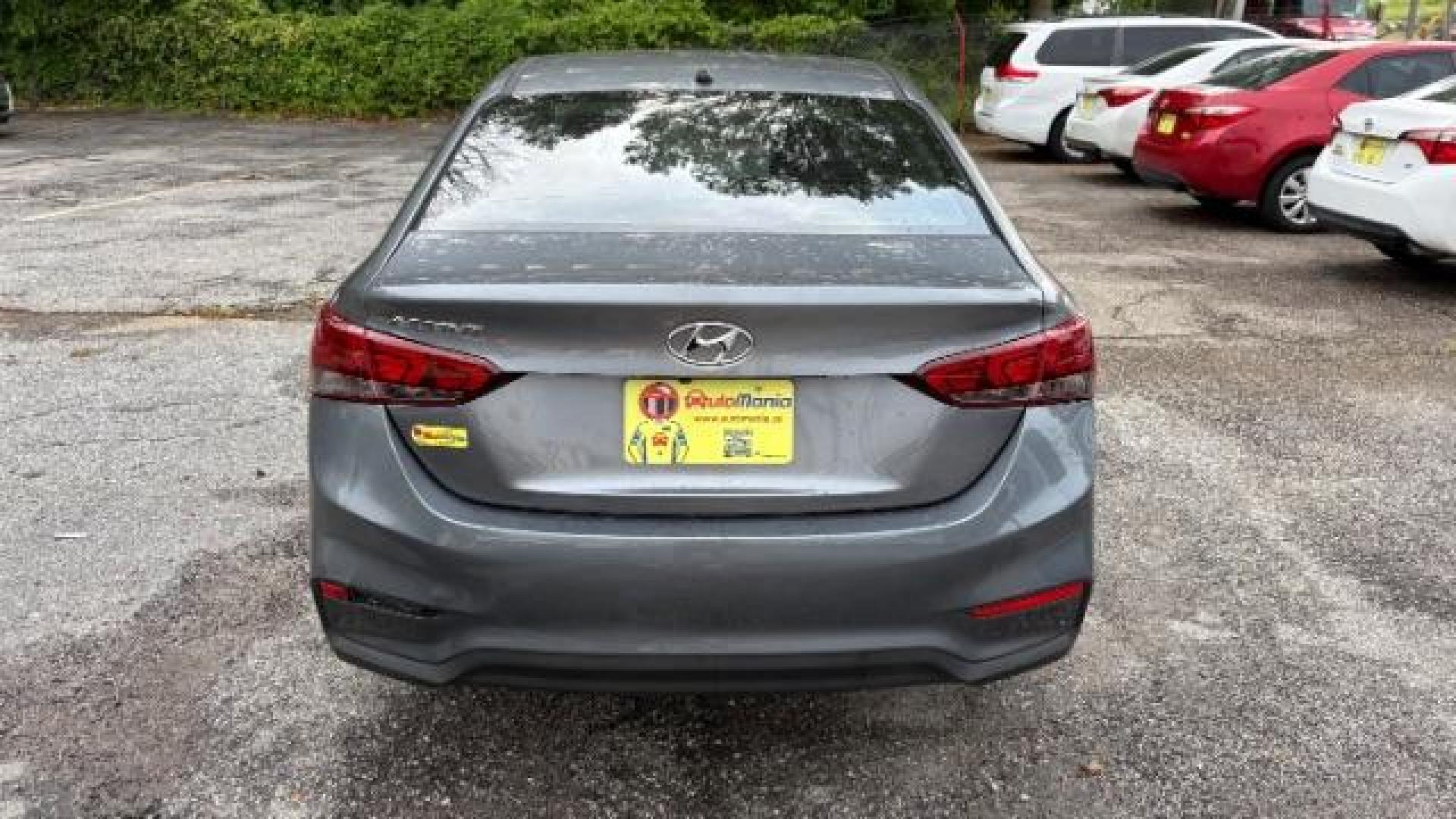 2018 Gray Hyundai Accent SE (3KPC24A3XJE) with an 1.6L I-4 gasoline direct injection engine, located at 1806 Veterans Memorial Hwy SW, Austell, GA, 30168, (770) 944-9558, 33.817959, -84.606987 - Photo#4