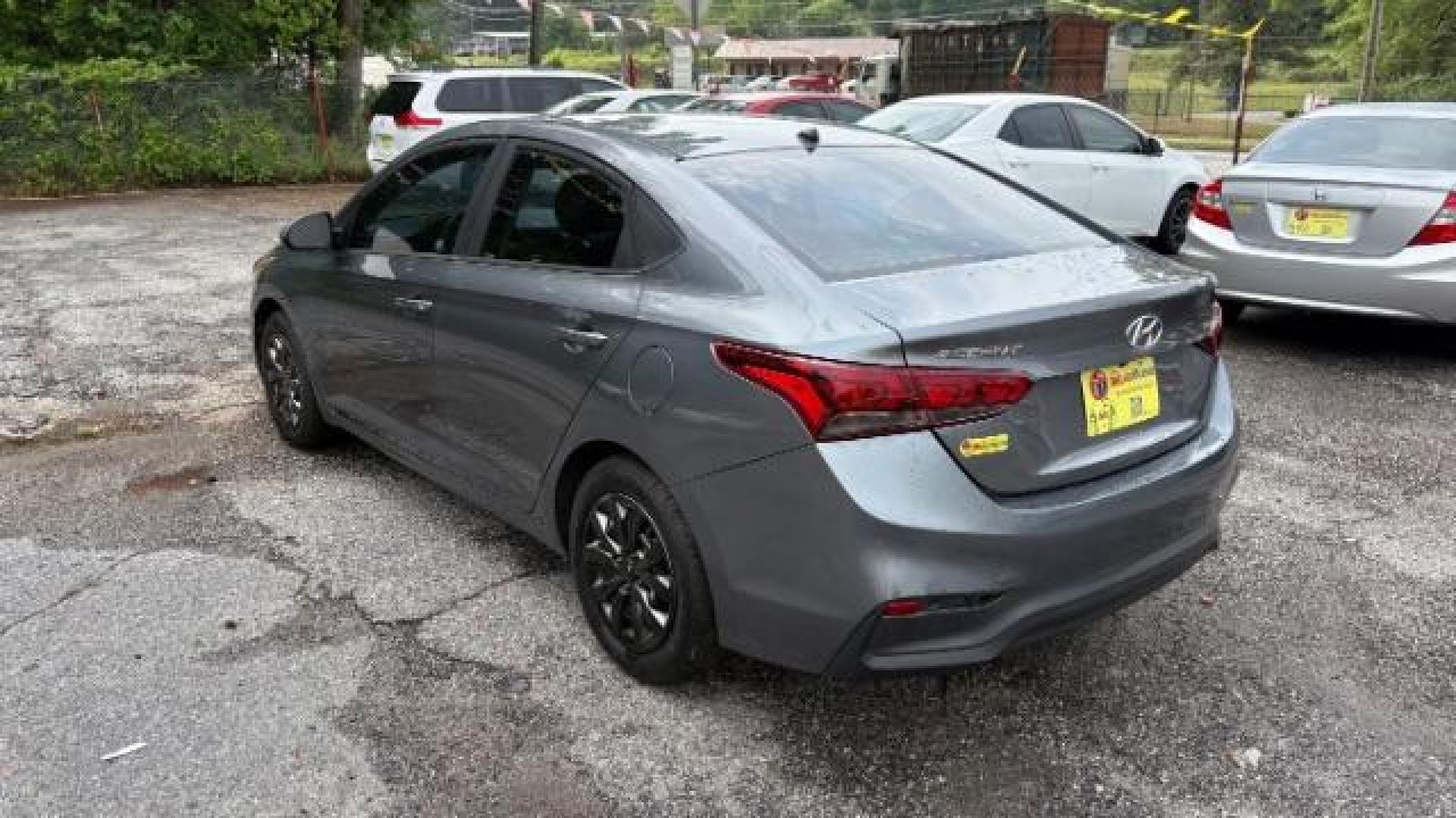 2018 Gray Hyundai Accent SE (3KPC24A3XJE) with an 1.6L I-4 gasoline direct injection engine, located at 1806 Veterans Memorial Hwy SW, Austell, GA, 30168, (770) 944-9558, 33.817959, -84.606987 - Photo#5