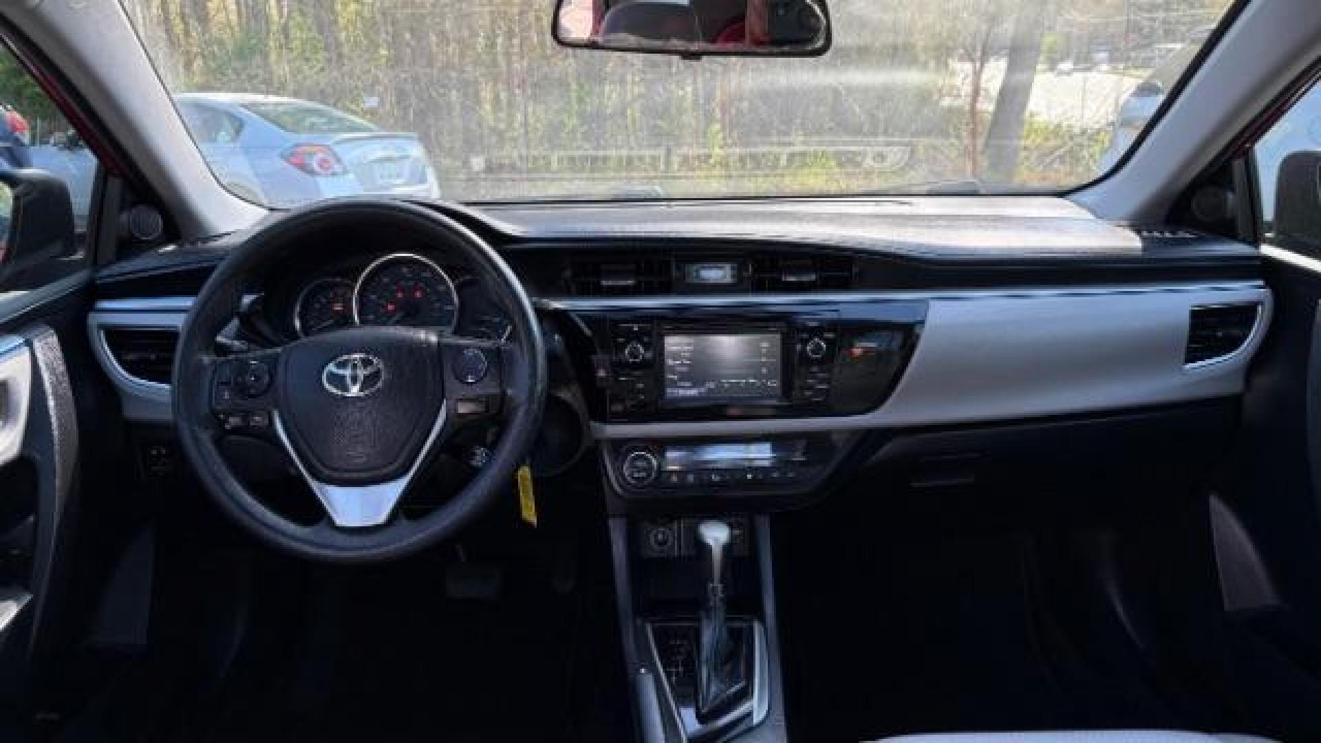 2015 RED Toyota Corolla LE (2T1BURHE7FC) with an 1.8L I-4 DOHC engine, located at 1806 Veterans Memorial Hwy SW, Austell, GA, 30168, (770) 944-9558, 33.817959, -84.606987 - Photo#7