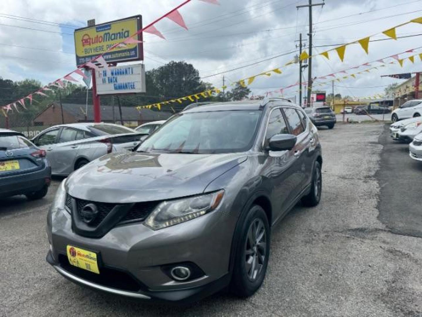 2016 GRAY Nissan Rogue SL (5N1AT2MT5GC) with an 2.5L I-4 DOHC engine, located at 1806 Veterans Memorial Hwy SW, Austell, GA, 30168, (770) 944-9558, 33.817959, -84.606987 - Photo#0