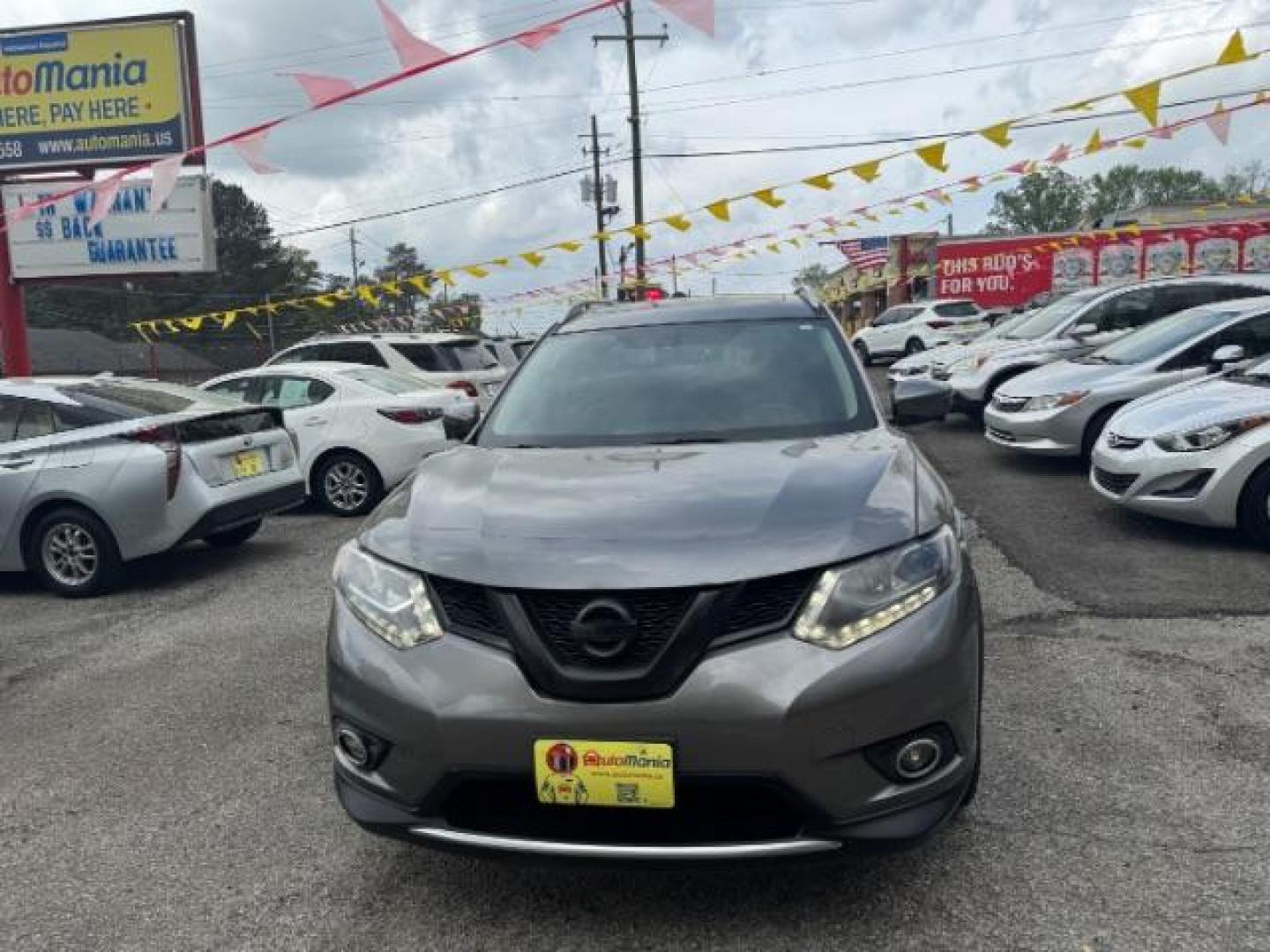 2016 GRAY Nissan Rogue SL (5N1AT2MT5GC) with an 2.5L I-4 DOHC engine, located at 1806 Veterans Memorial Hwy SW, Austell, GA, 30168, (770) 944-9558, 33.817959, -84.606987 - Photo#1