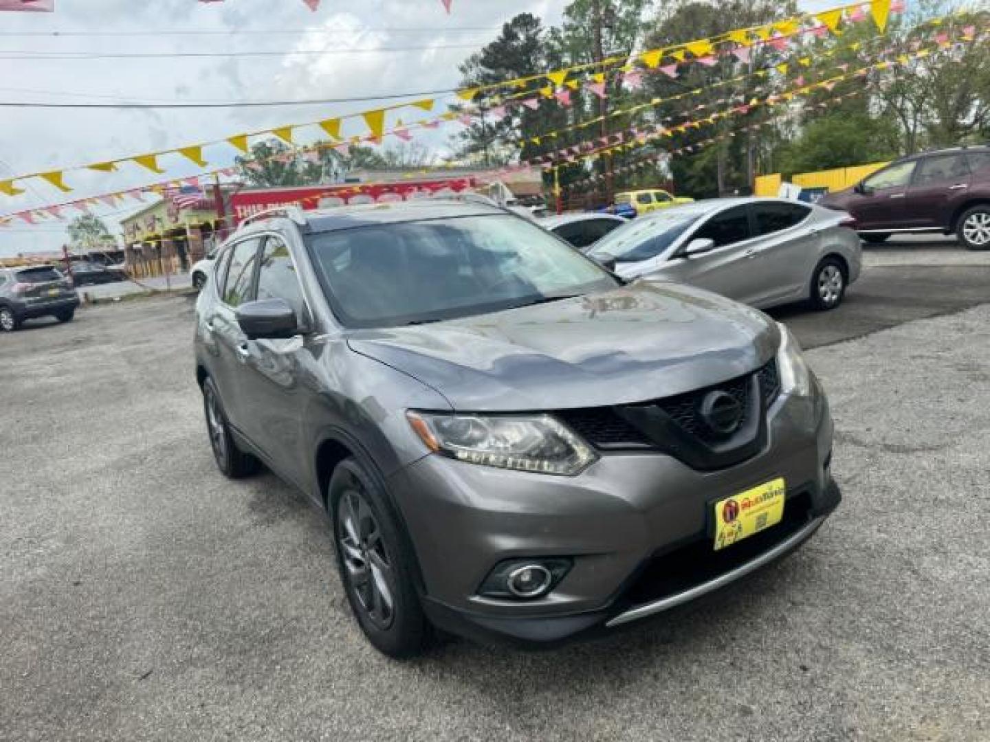 2016 GRAY Nissan Rogue SL (5N1AT2MT5GC) with an 2.5L I-4 DOHC engine, located at 1806 Veterans Memorial Hwy SW, Austell, GA, 30168, (770) 944-9558, 33.817959, -84.606987 - Photo#2