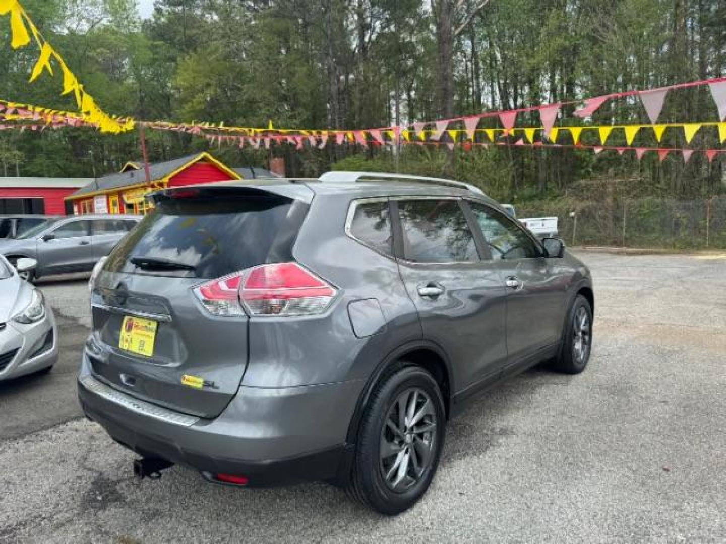 2016 GRAY Nissan Rogue SL (5N1AT2MT5GC) with an 2.5L I-4 DOHC engine, located at 1806 Veterans Memorial Hwy SW, Austell, GA, 30168, (770) 944-9558, 33.817959, -84.606987 - Photo#3