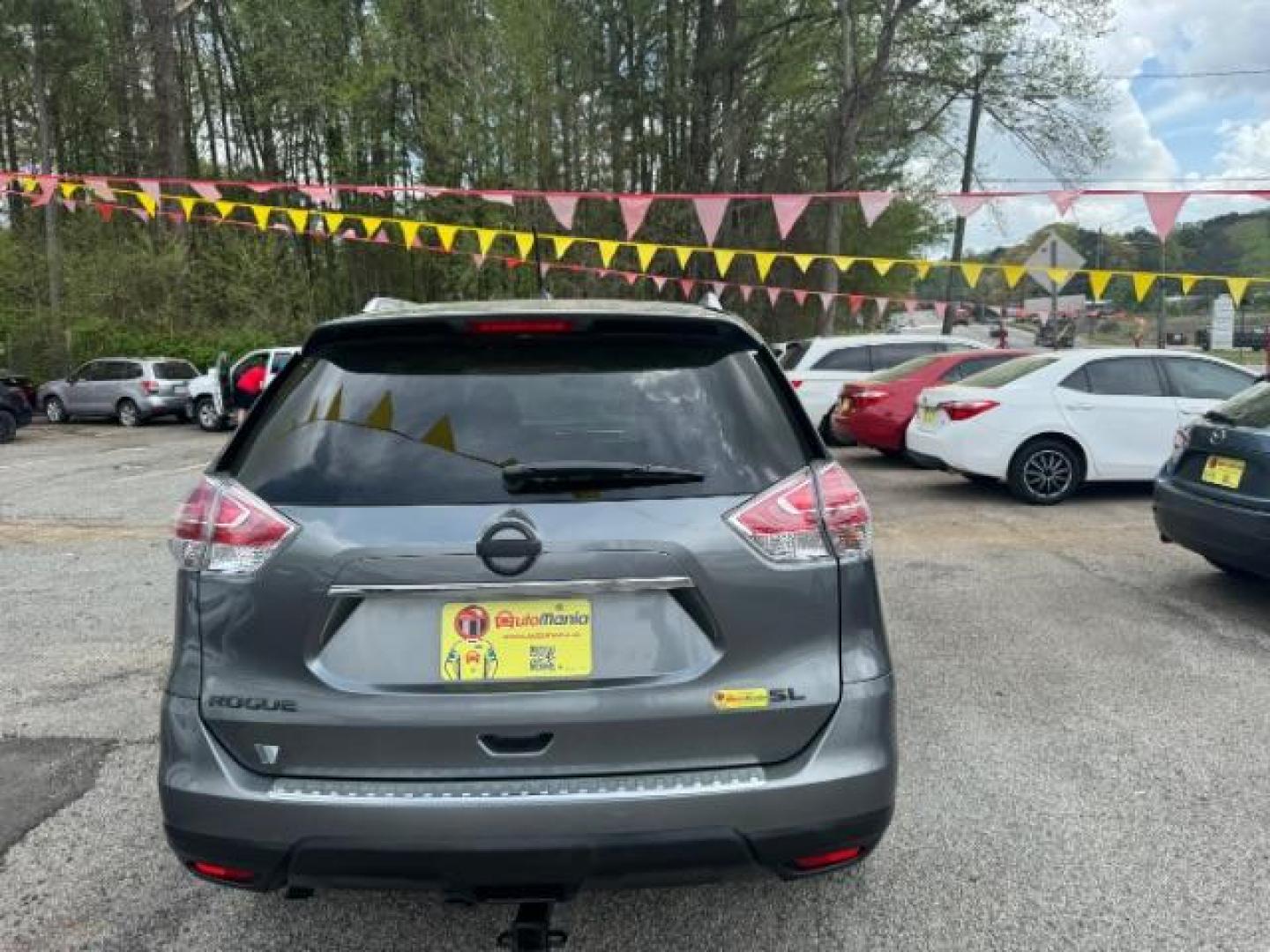 2016 GRAY Nissan Rogue SL (5N1AT2MT5GC) with an 2.5L I-4 DOHC engine, located at 1806 Veterans Memorial Hwy SW, Austell, GA, 30168, (770) 944-9558, 33.817959, -84.606987 - Photo#4