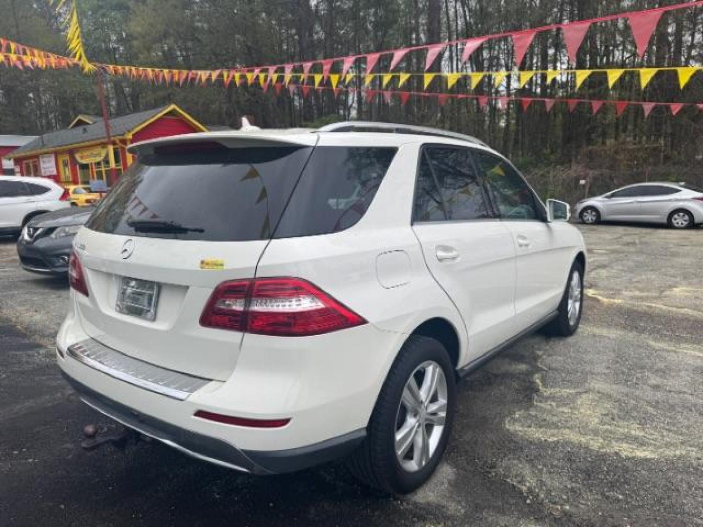 2013 White Mercedes-Benz ML 350 ML350 (4JGDA5JB9DA) , located at 1806 Veterans Memorial Hwy SW, Austell, GA, 30168, (770) 944-9558, 33.817959, -84.606987 - Photo#3