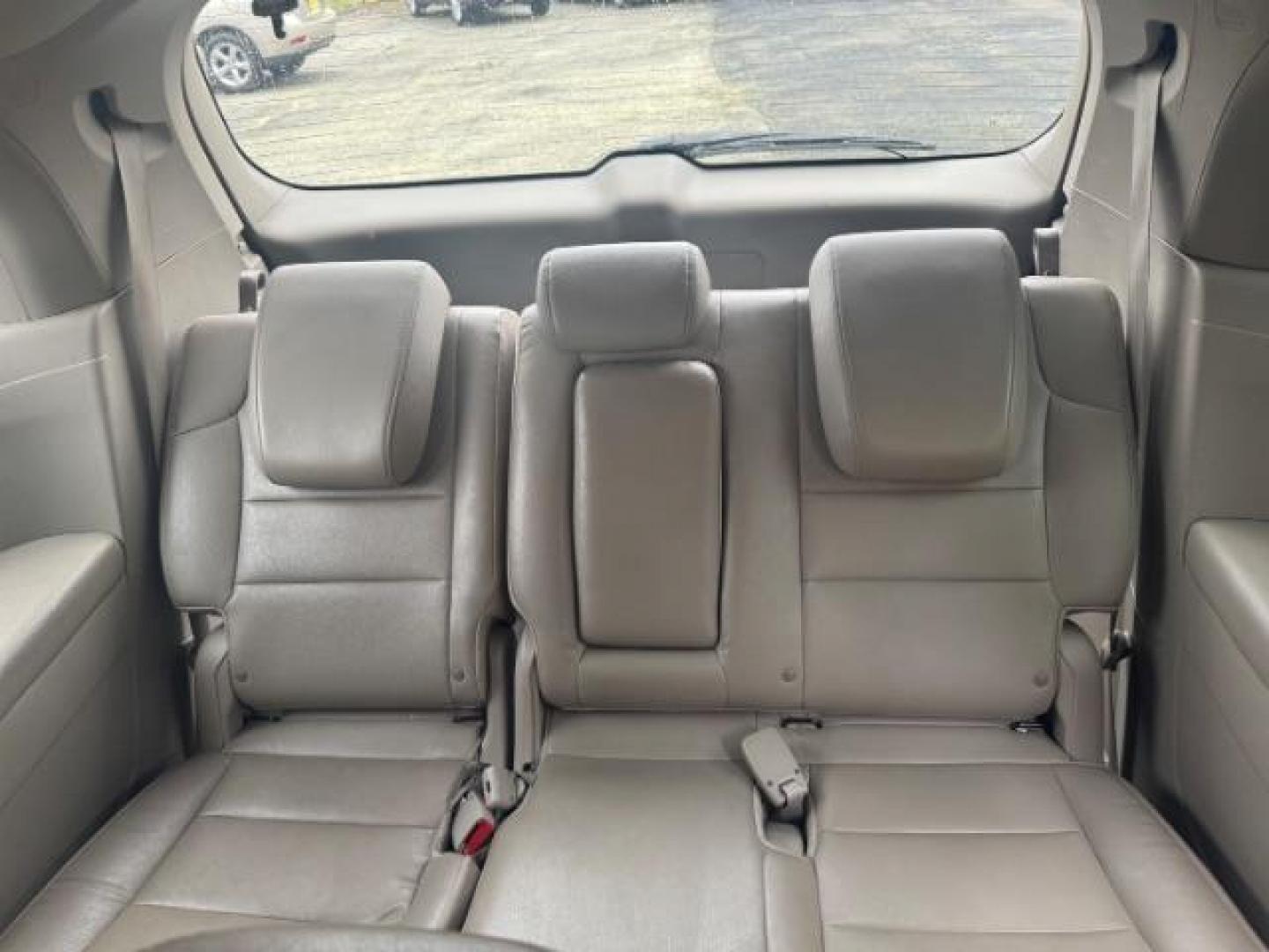 2014 White Honda Odyssey Touring | Touring Elite (5FNRL5H97EB) with an 3.5L V-6 i-VTEC variable valve control engine, located at 1806 Veterans Memorial Hwy SW, Austell, GA, 30168, (770) 944-9558, 33.817959, -84.606987 - Photo#11