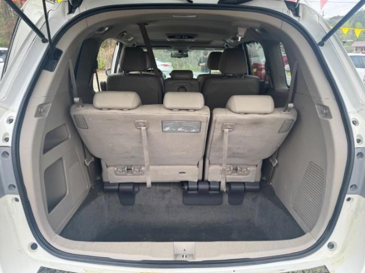 2014 White Honda Odyssey Touring | Touring Elite (5FNRL5H97EB) with an 3.5L V-6 i-VTEC variable valve control engine, located at 1806 Veterans Memorial Hwy SW, Austell, GA, 30168, (770) 944-9558, 33.817959, -84.606987 - Photo#13