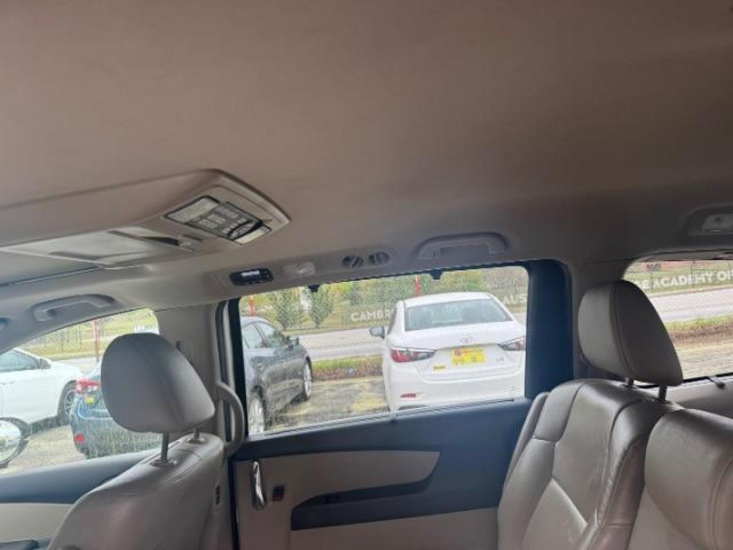 2014 White Honda Odyssey Touring | Touring Elite (5FNRL5H97EB) with an 3.5L V-6 i-VTEC variable valve control engine, located at 1806 Veterans Memorial Hwy SW, Austell, GA, 30168, (770) 944-9558, 33.817959, -84.606987 - Photo#15
