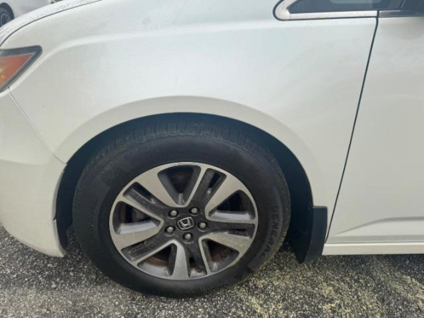 2014 White Honda Odyssey Touring | Touring Elite (5FNRL5H97EB) with an 3.5L V-6 i-VTEC variable valve control engine, located at 1806 Veterans Memorial Hwy SW, Austell, GA, 30168, (770) 944-9558, 33.817959, -84.606987 - Photo#19