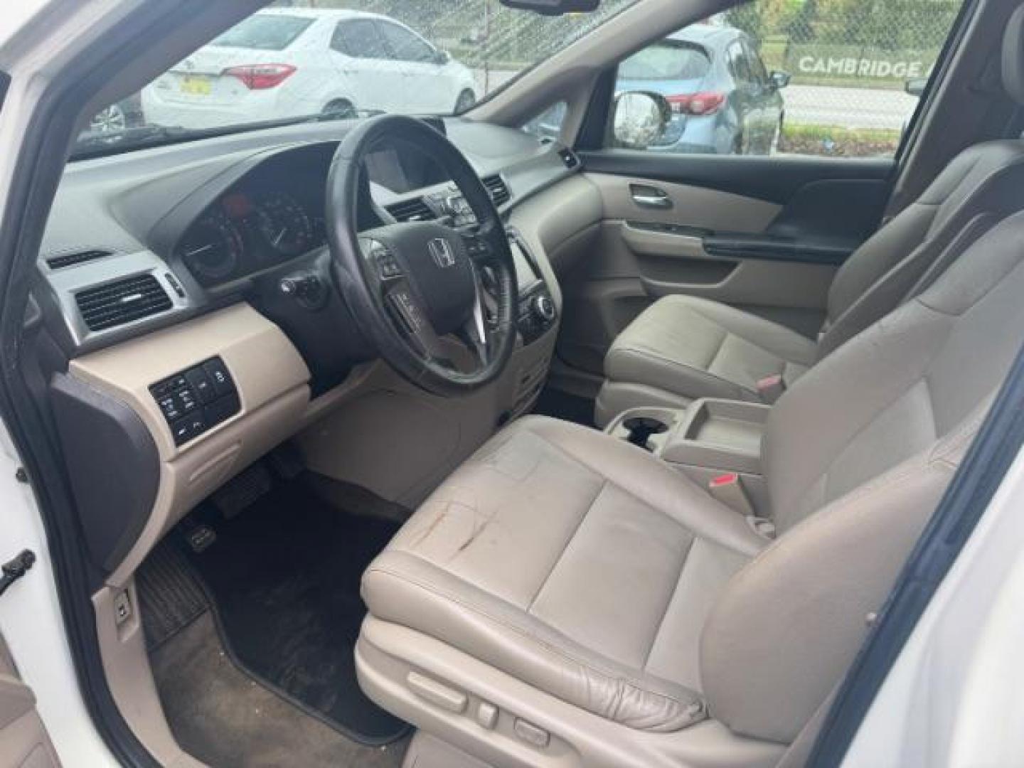 2014 White Honda Odyssey Touring | Touring Elite (5FNRL5H97EB) with an 3.5L V-6 i-VTEC variable valve control engine, located at 1806 Veterans Memorial Hwy SW, Austell, GA, 30168, (770) 944-9558, 33.817959, -84.606987 - Photo#5