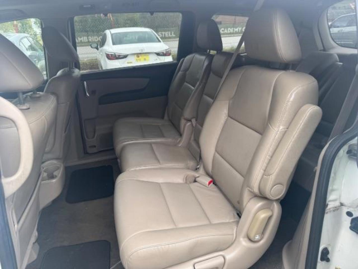 2014 White Honda Odyssey Touring | Touring Elite (5FNRL5H97EB) with an 3.5L V-6 i-VTEC variable valve control engine, located at 1806 Veterans Memorial Hwy SW, Austell, GA, 30168, (770) 944-9558, 33.817959, -84.606987 - Photo#6
