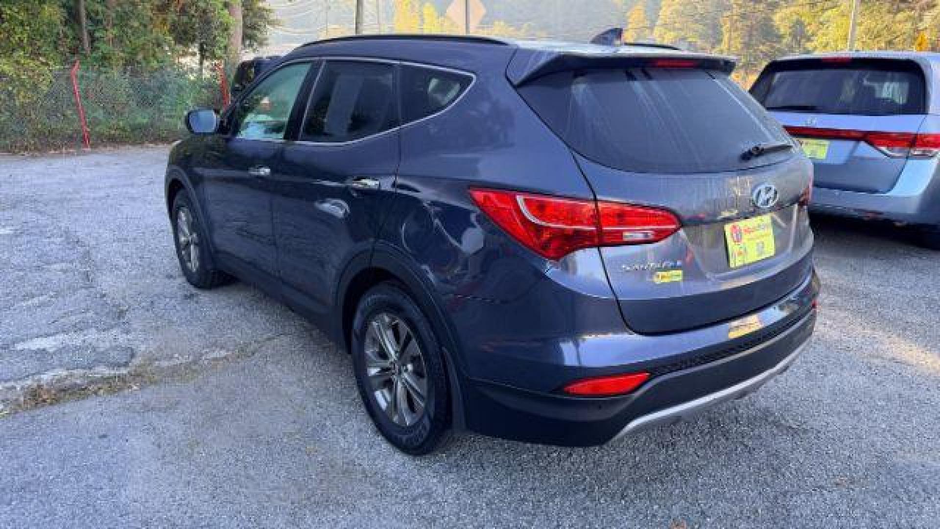 2014 Gray Hyundai Santa Fe Sport 2.4L (5XYZU3LB9EG) with an Theta II 2.4L I-4 ga engine, located at 1806 Veterans Memorial Hwy SW, Austell, GA, 30168, (770) 944-9558, 33.817959, -84.606987 - Photo#5