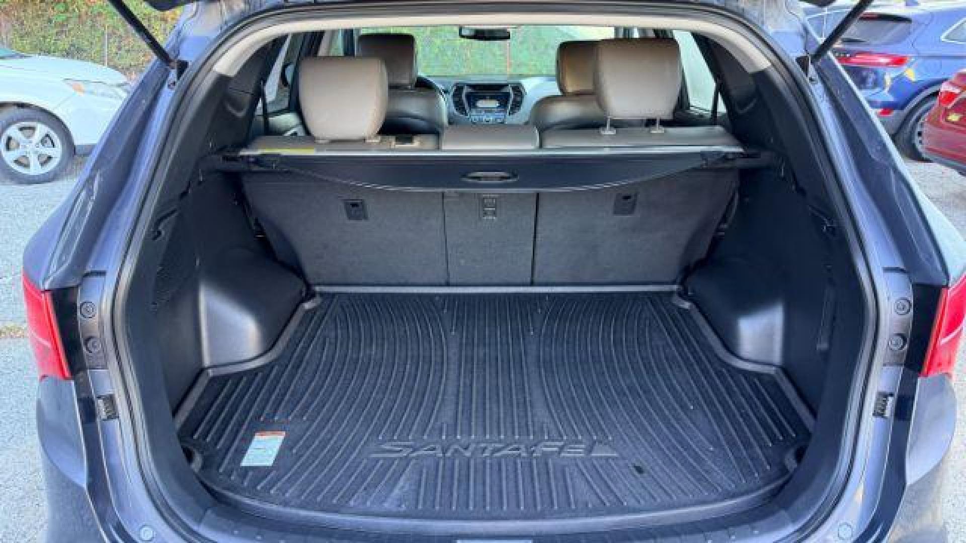 2014 Gray Hyundai Santa Fe Sport 2.4L (5XYZU3LB9EG) with an Theta II 2.4L I-4 ga engine, located at 1806 Veterans Memorial Hwy SW, Austell, GA, 30168, (770) 944-9558, 33.817959, -84.606987 - Photo#6