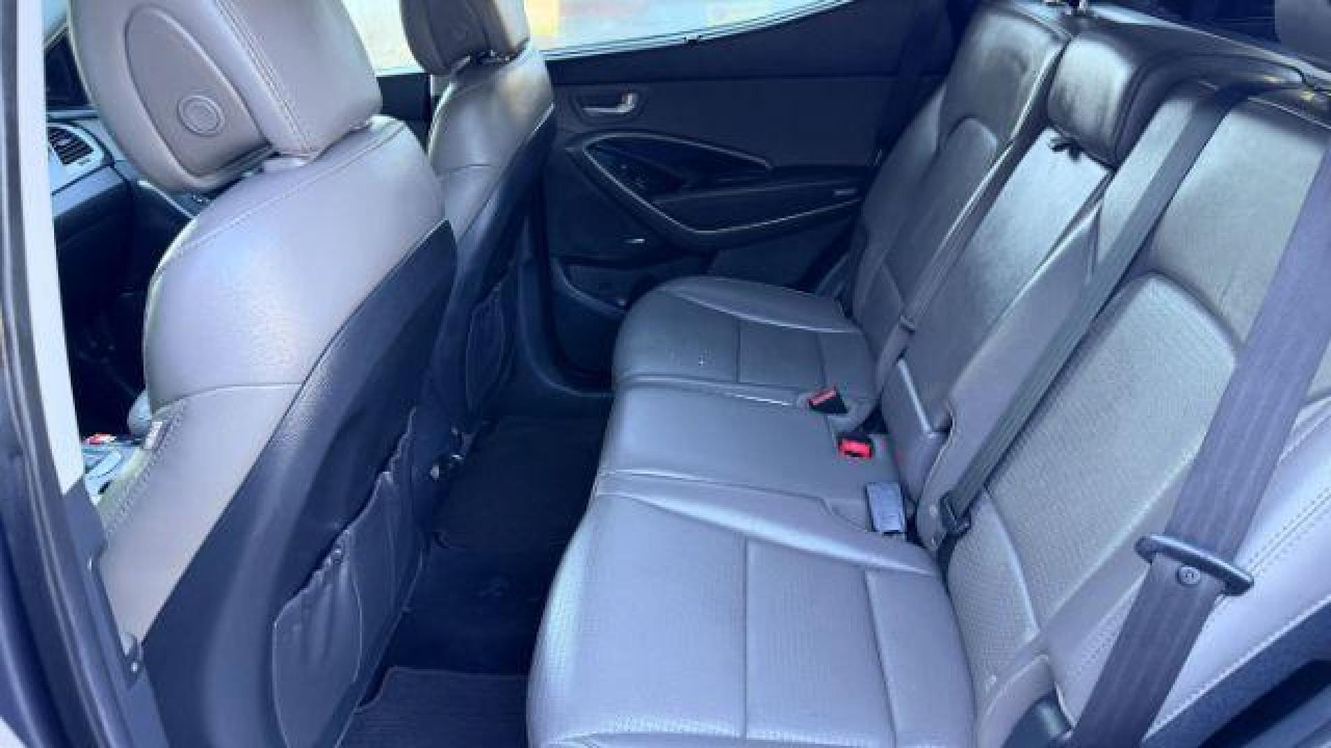 2014 Gray Hyundai Santa Fe Sport 2.4L (5XYZU3LB9EG) with an Theta II 2.4L I-4 ga engine, located at 1806 Veterans Memorial Hwy SW, Austell, GA, 30168, (770) 944-9558, 33.817959, -84.606987 - Photo#7