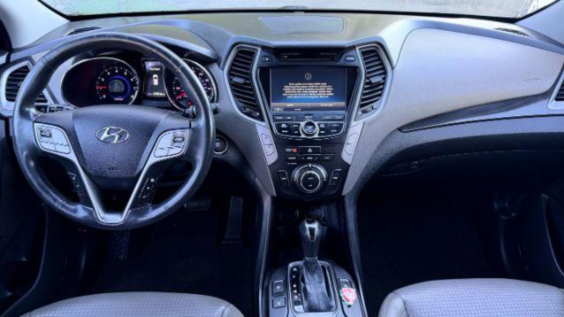 2014 Gray Hyundai Santa Fe Sport 2.4L (5XYZU3LB9EG) with an Theta II 2.4L I-4 ga engine, located at 1806 Veterans Memorial Hwy SW, Austell, GA, 30168, (770) 944-9558, 33.817959, -84.606987 - Photo#8