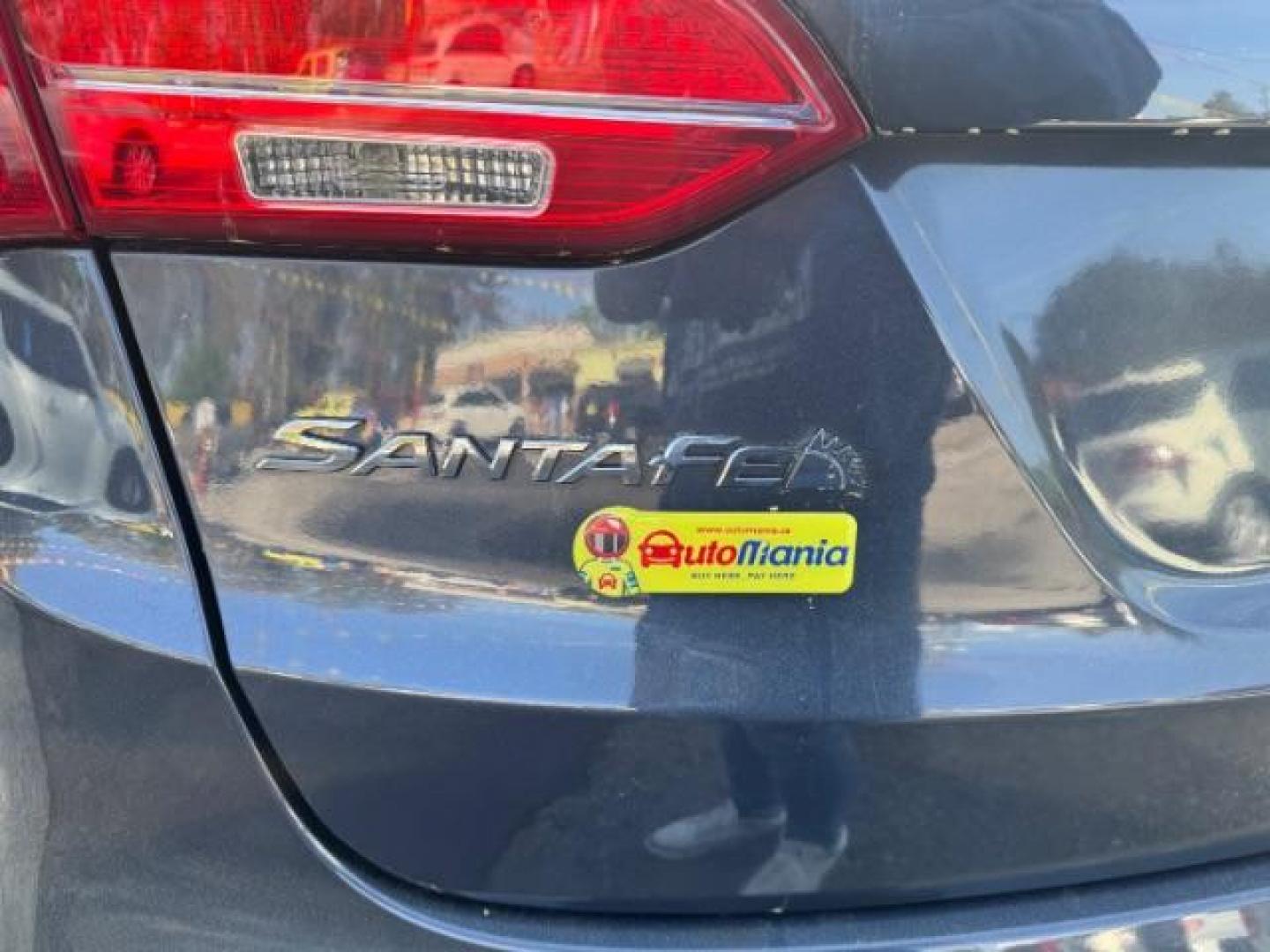 2014 Gray Hyundai Santa Fe Sport 2.4L (5XYZU3LB9EG) with an Theta II 2.4L I-4 gasoline direct injection engine, located at 1806 Veterans Memorial Hwy SW, Austell, GA, 30168, (770) 944-9558, 33.817959, -84.606987 - Photo#13