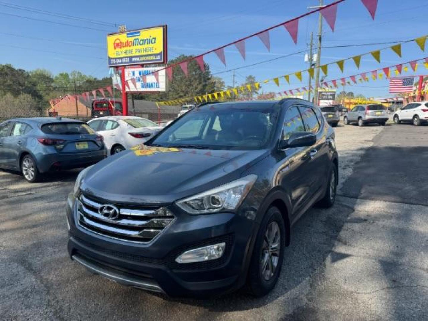2014 Gray Hyundai Santa Fe Sport 2.4L (5XYZU3LB9EG) with an Theta II 2.4L I-4 gasoline direct injection engine, located at 1806 Veterans Memorial Hwy SW, Austell, GA, 30168, (770) 944-9558, 33.817959, -84.606987 - Photo#1