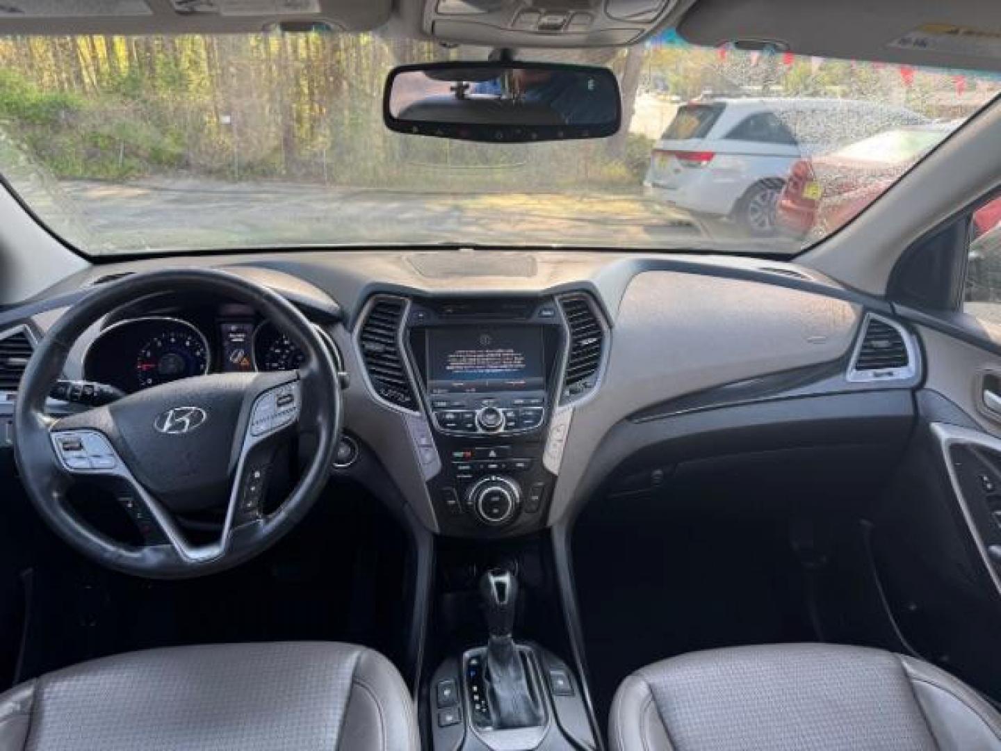 2014 Gray Hyundai Santa Fe Sport 2.4L (5XYZU3LB9EG) with an Theta II 2.4L I-4 gasoline direct injection engine, located at 1806 Veterans Memorial Hwy SW, Austell, GA, 30168, (770) 944-9558, 33.817959, -84.606987 - Photo#5