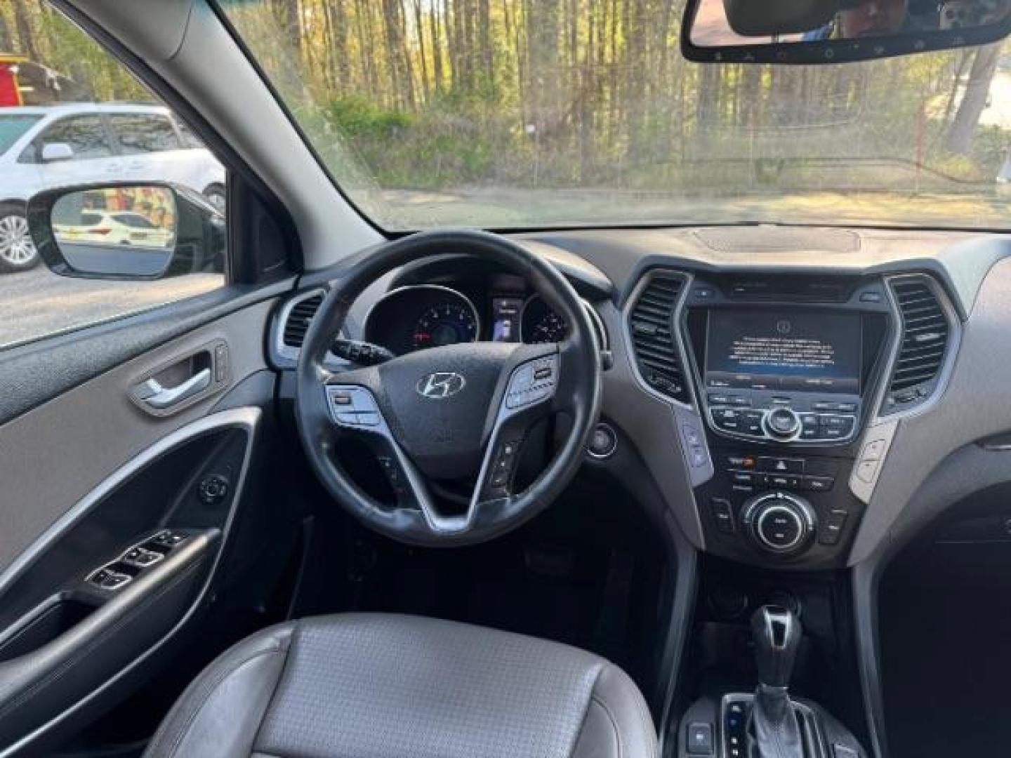 2014 Gray Hyundai Santa Fe Sport 2.4L (5XYZU3LB9EG) with an Theta II 2.4L I-4 gasoline direct injection engine, located at 1806 Veterans Memorial Hwy SW, Austell, GA, 30168, (770) 944-9558, 33.817959, -84.606987 - Photo#6