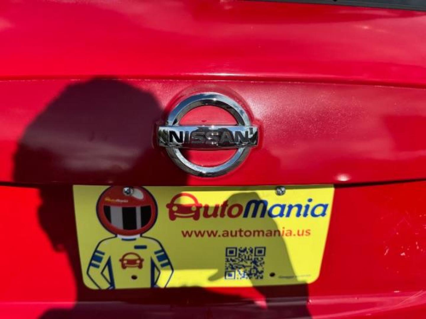 2015 Red Nissan Juke SV (JN8AF5MR5FT) with an 1.6L I-4 gasoline direct injection engine, located at 1806 Veterans Memorial Hwy SW, Austell, GA, 30168, (770) 944-9558, 33.817959, -84.606987 - Photo#12