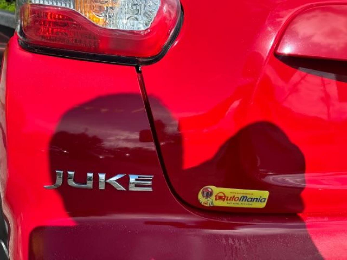 2015 Red Nissan Juke SV (JN8AF5MR5FT) with an 1.6L I-4 gasoline direct injection engine, located at 1806 Veterans Memorial Hwy SW, Austell, GA, 30168, (770) 944-9558, 33.817959, -84.606987 - Photo#13