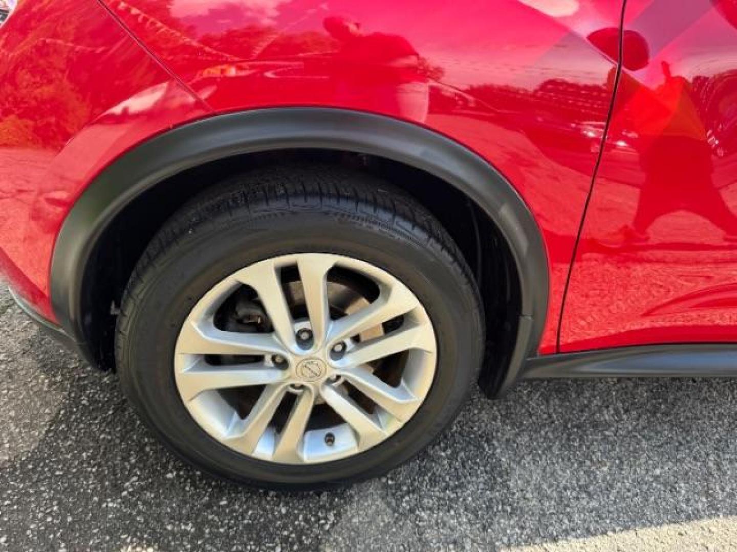 2015 Red Nissan Juke SV (JN8AF5MR5FT) with an 1.6L I-4 gasoline direct injection engine, located at 1806 Veterans Memorial Hwy SW, Austell, GA, 30168, (770) 944-9558, 33.817959, -84.606987 - Photo#16