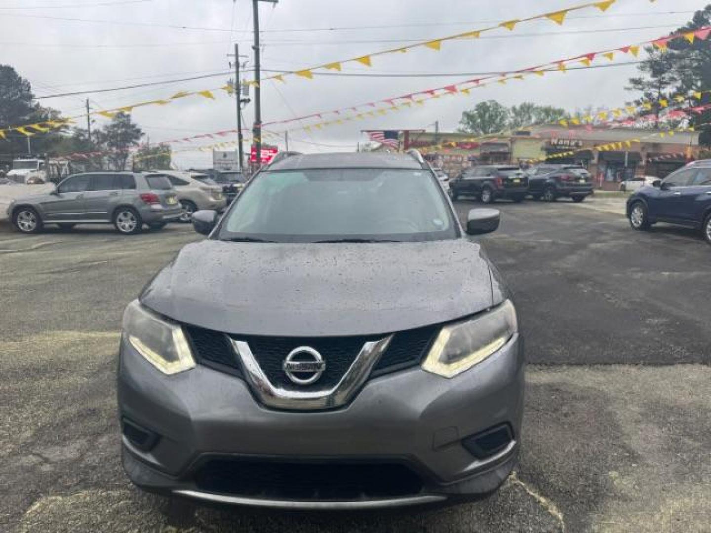 2016 Gray Nissan Rogue SV (KNMAT2MT9GP) with an 2.5L I-4 DOHC engine, located at 1806 Veterans Memorial Hwy SW, Austell, GA, 30168, (770) 944-9558, 33.817959, -84.606987 - Photo#1