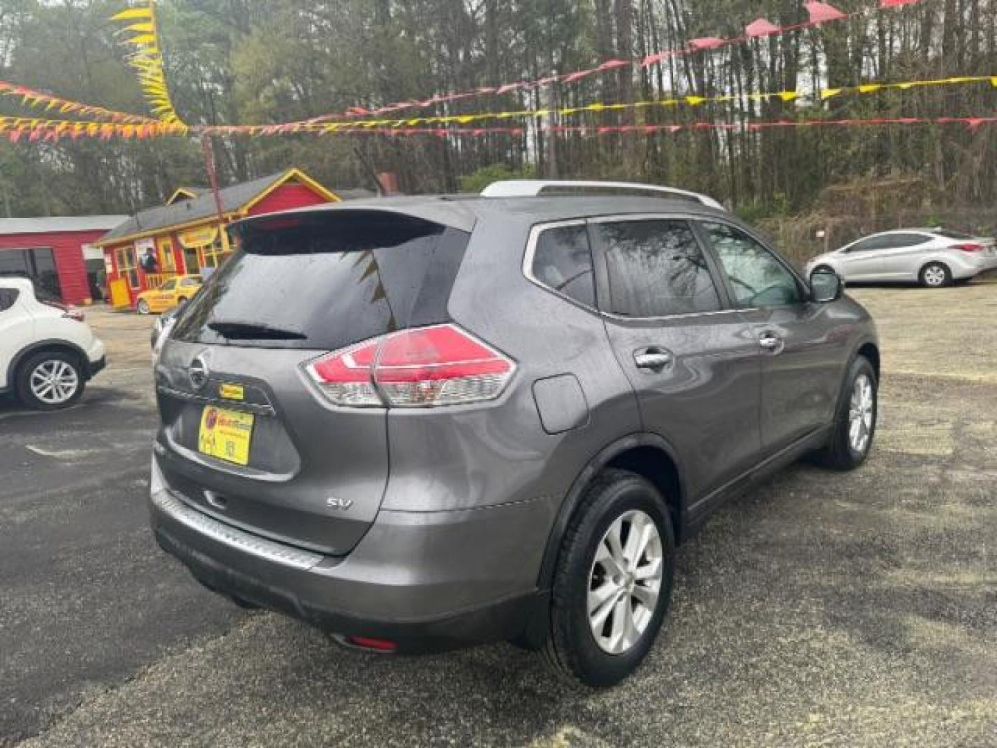 2016 Gray Nissan Rogue SV (KNMAT2MT9GP) with an 2.5L I-4 DOHC engine, located at 1806 Veterans Memorial Hwy SW, Austell, GA, 30168, (770) 944-9558, 33.817959, -84.606987 - Photo#3