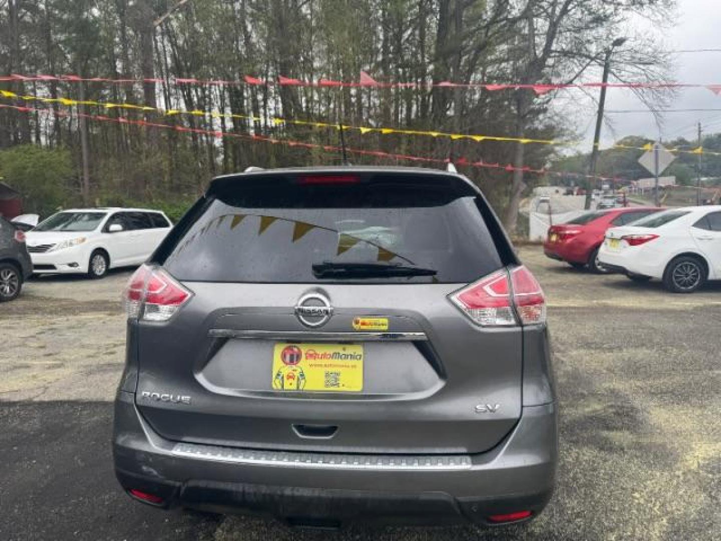 2016 Gray Nissan Rogue SV (KNMAT2MT9GP) with an 2.5L I-4 DOHC engine, located at 1806 Veterans Memorial Hwy SW, Austell, GA, 30168, (770) 944-9558, 33.817959, -84.606987 - Photo#4
