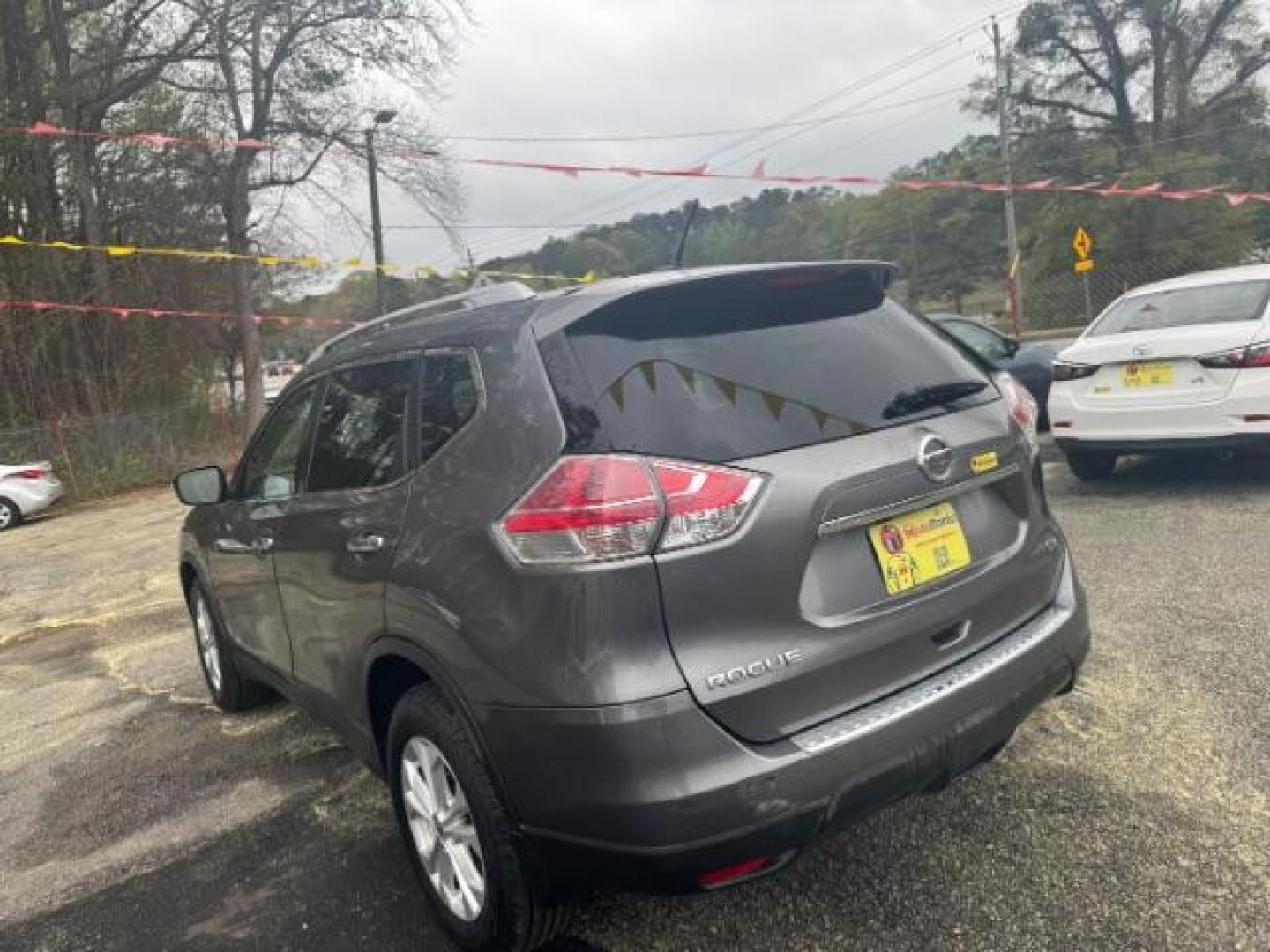 2016 Gray Nissan Rogue SV (KNMAT2MT9GP) with an 2.5L I-4 DOHC engine, located at 1806 Veterans Memorial Hwy SW, Austell, GA, 30168, (770) 944-9558, 33.817959, -84.606987 - Photo#5