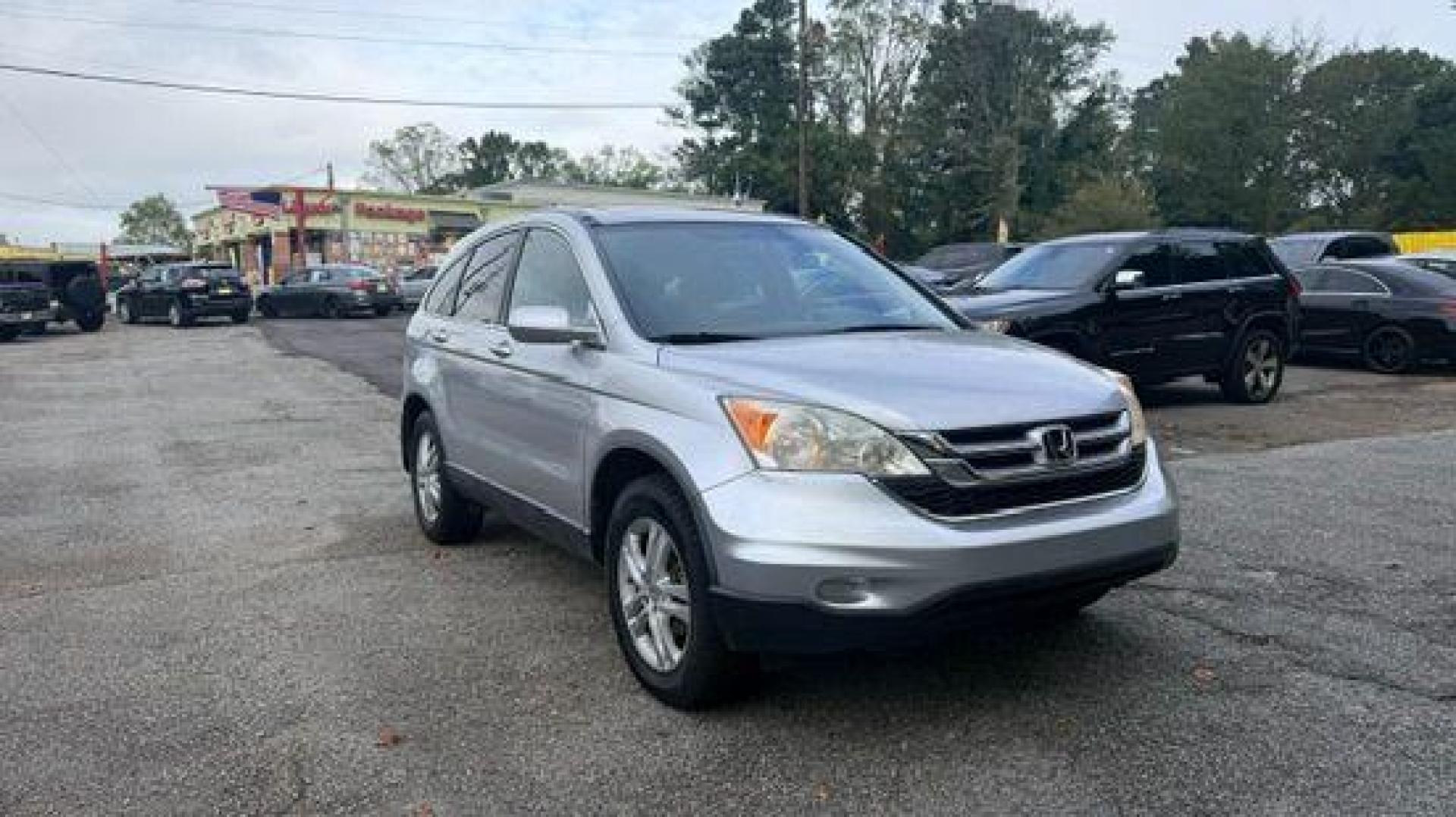 2011 Silver Honda CR-V EX-L (JHLRE3H75BC) with an 2.4L I-4 DOHC engine, located at 1806 Veterans Memorial Hwy SW, Austell, GA, 30168, (770) 944-9558, 33.817959, -84.606987 - Photo#2